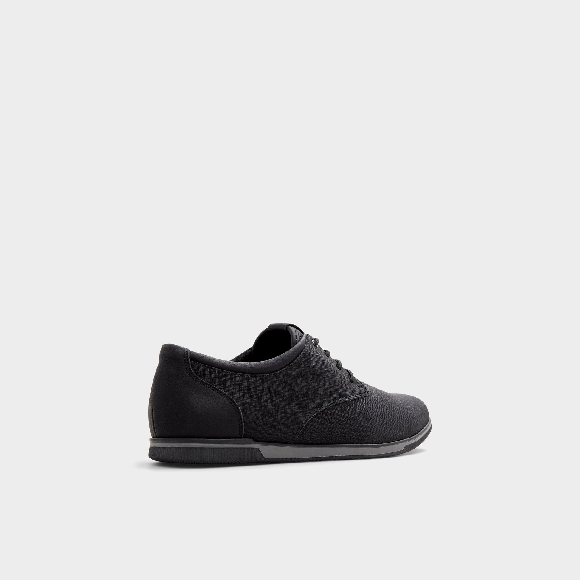 Three-quarter angle of Open Black Heron Low top sneaker's back side