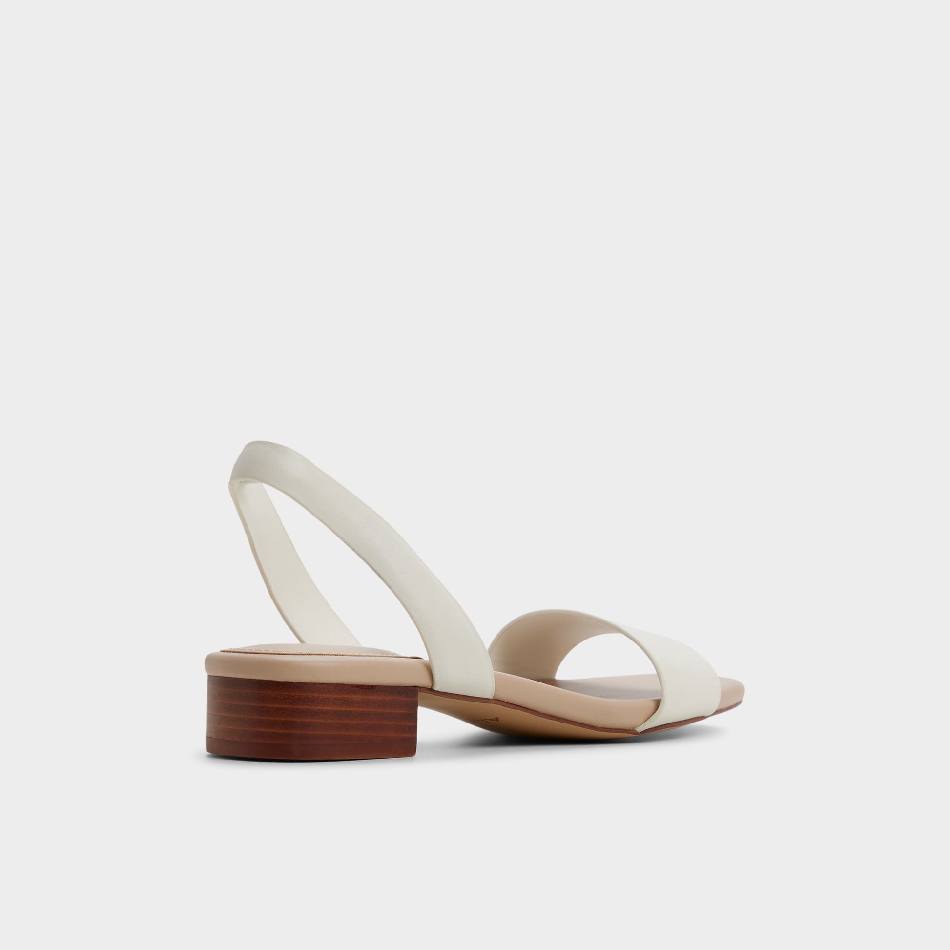 Three-quarter angle of White Dorenna Strappy sandal's back side