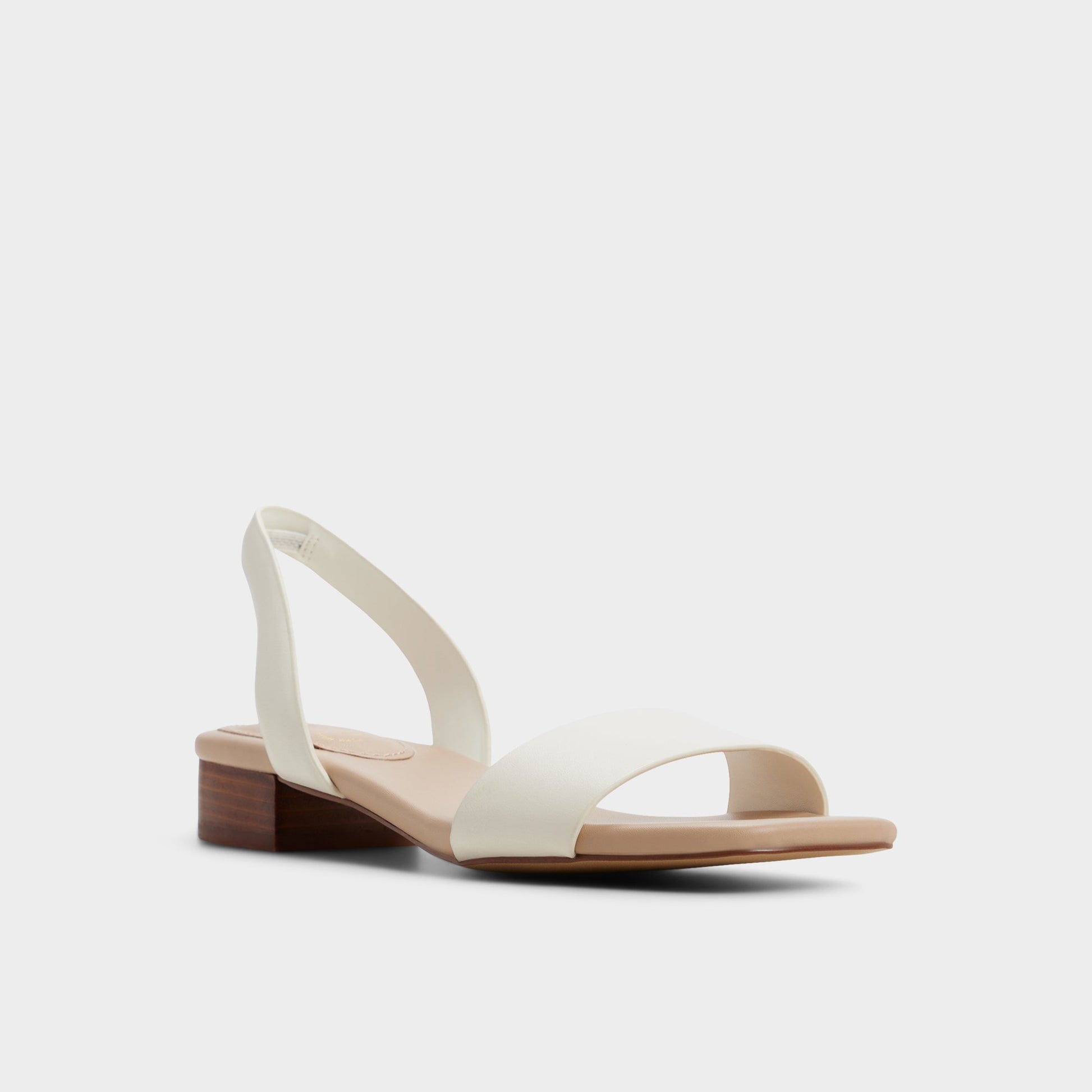 Three-quarter angle of White Dorenna Strappy sandal's front side