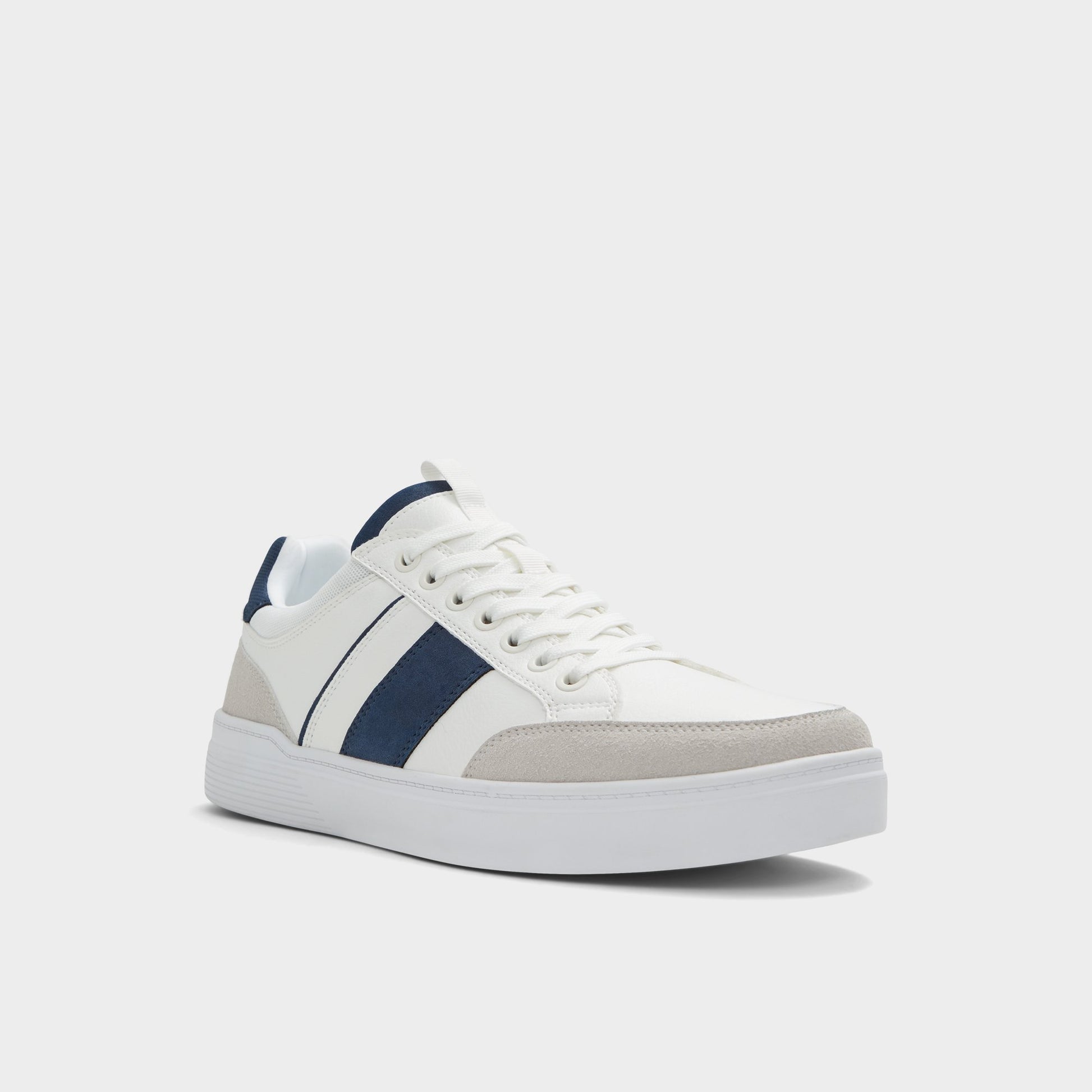Three-quarter angle of White overflow Elio Low top sneaker's front side