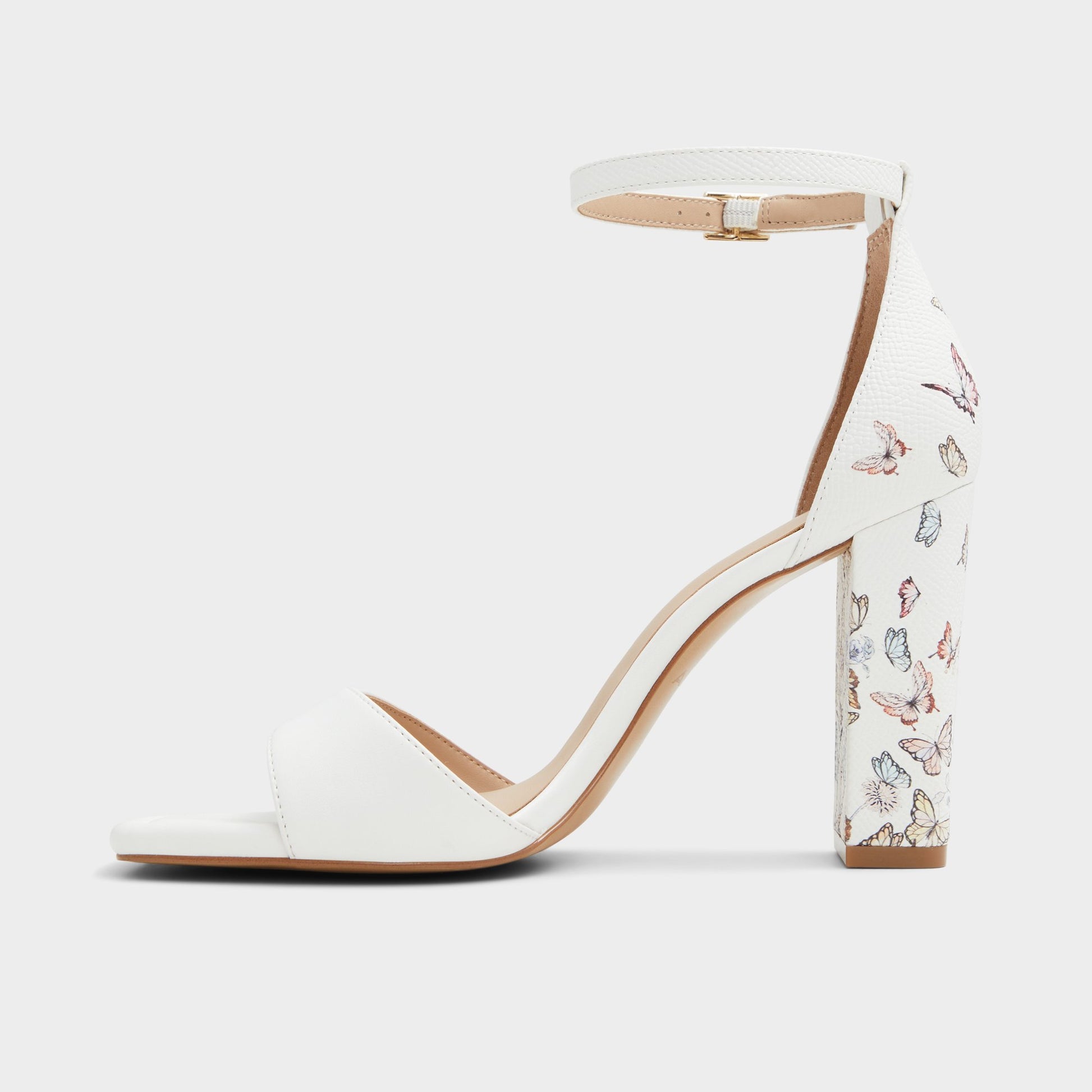Side view of White Multi Enaegyn Strappy heeled sandal