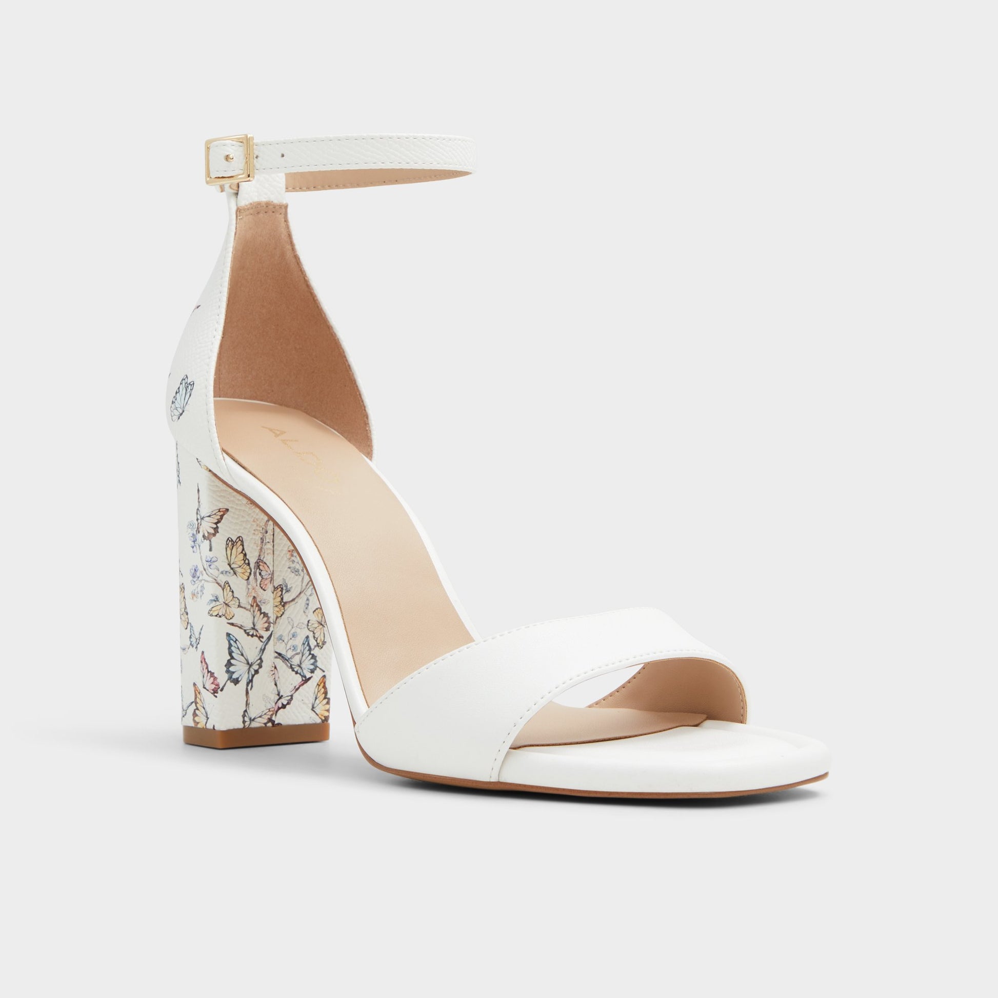 Three-quarter angle of White Multi Enaegyn Strappy heeled sandal's front side