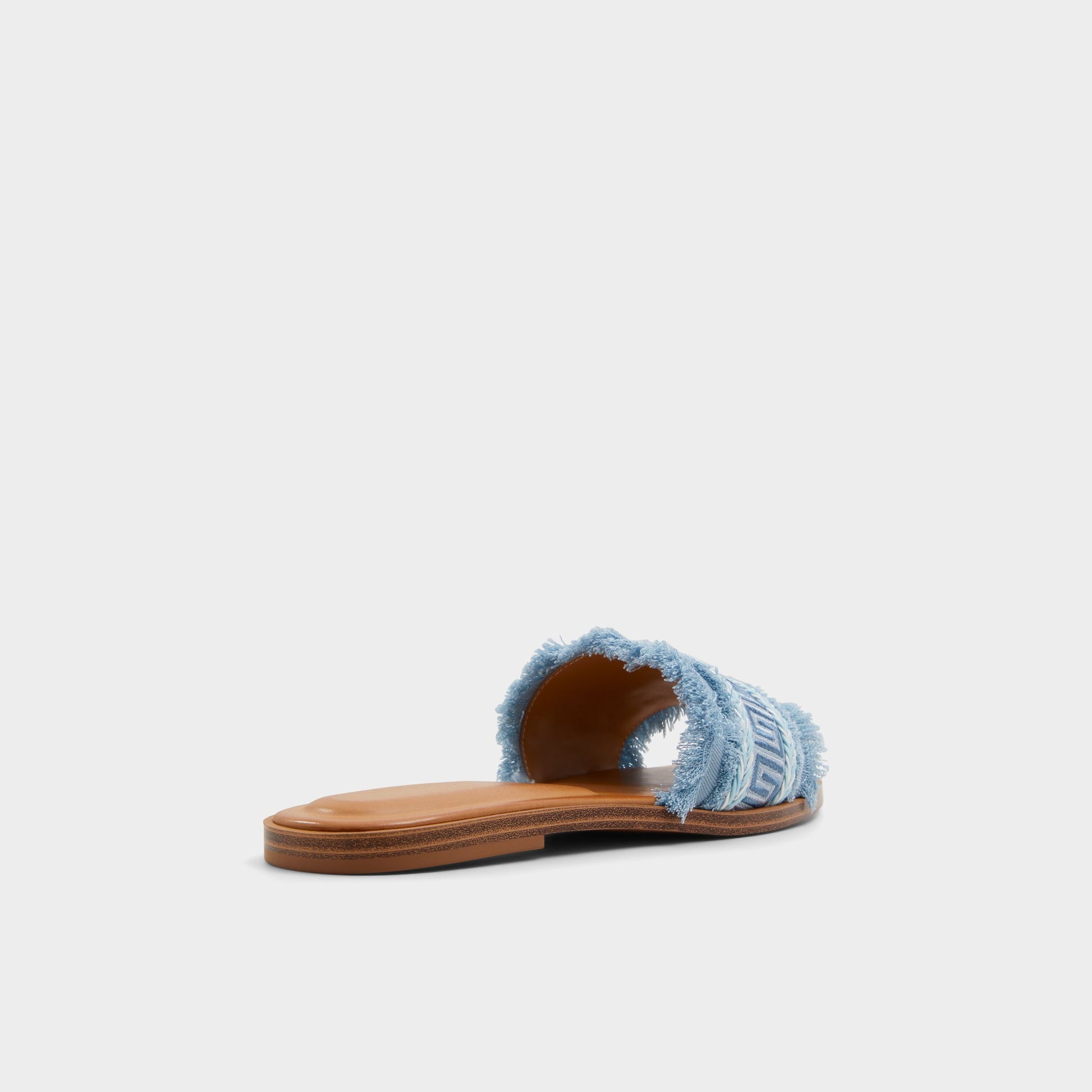 Three-quarter angle of Medium Blue Nalani Slide sandal's back side