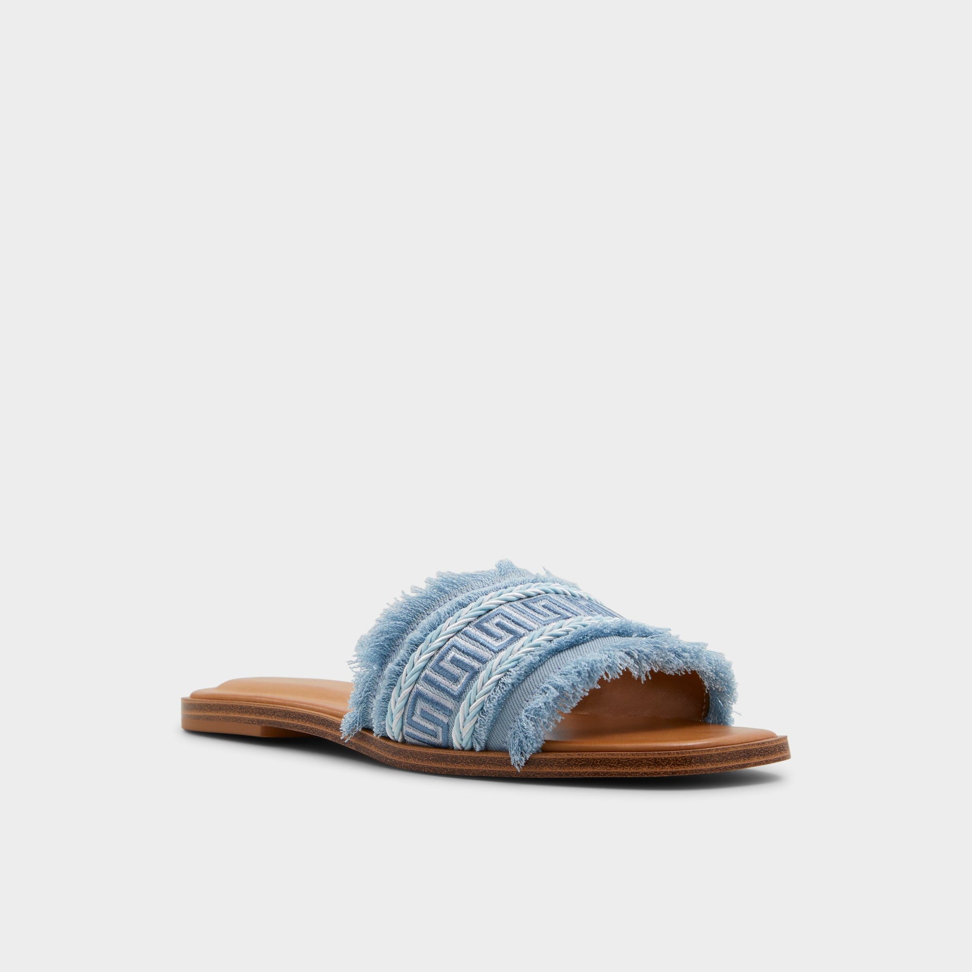 Three-quarter angle of Medium Blue Nalani Slide sandal's front side