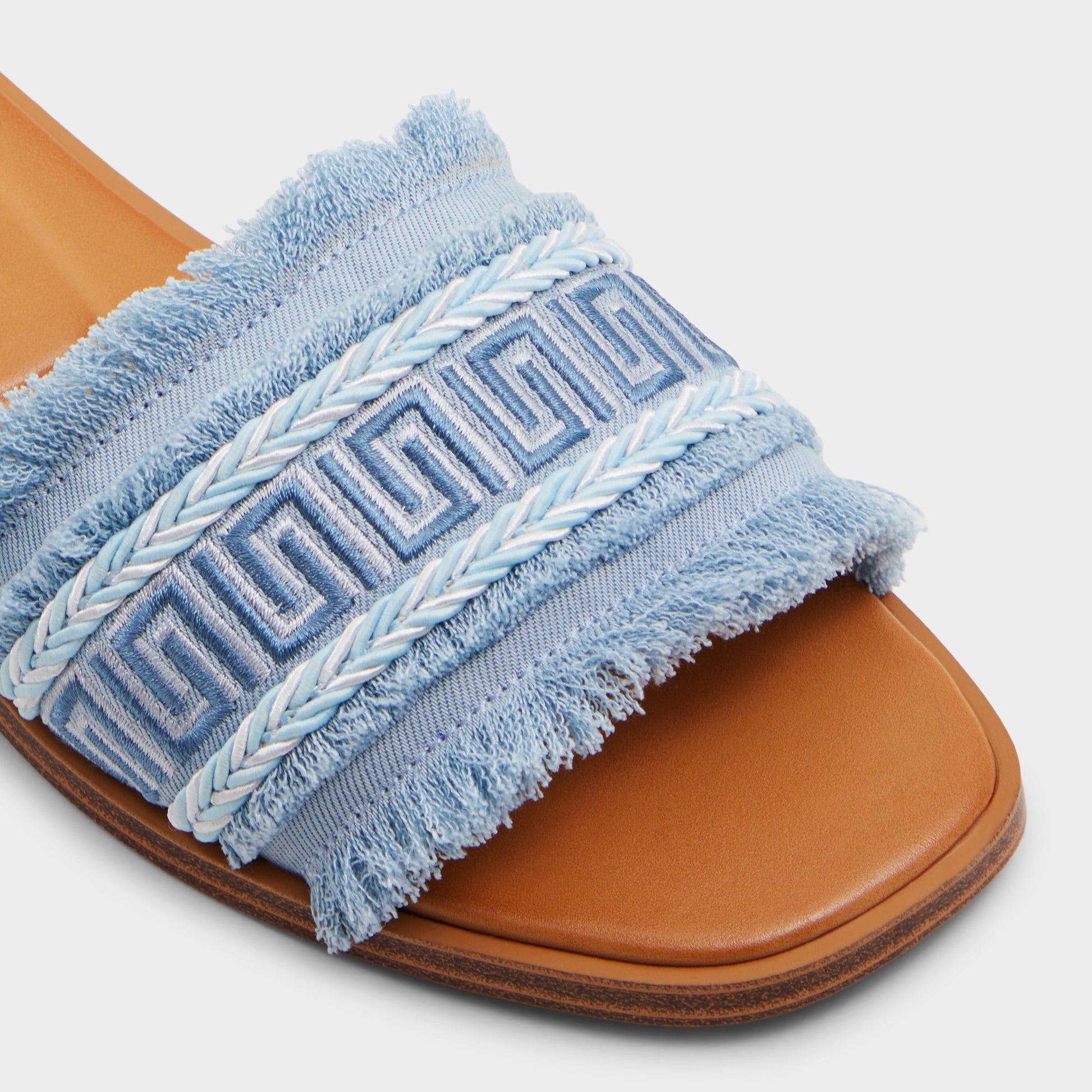 Close-up of the Medium Blue Nalani Slide sandal