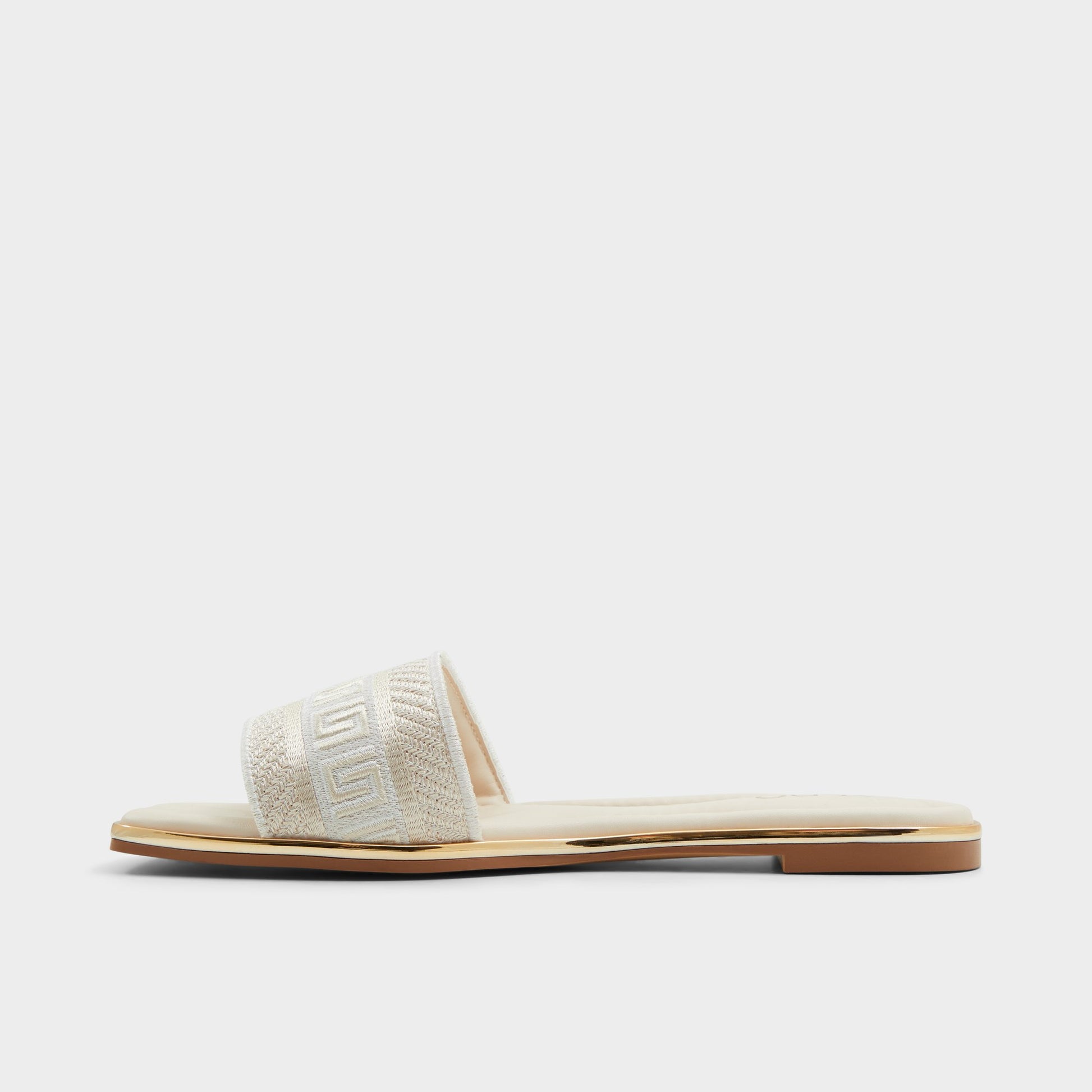 Side view of Other beige Oceania Slide sandal