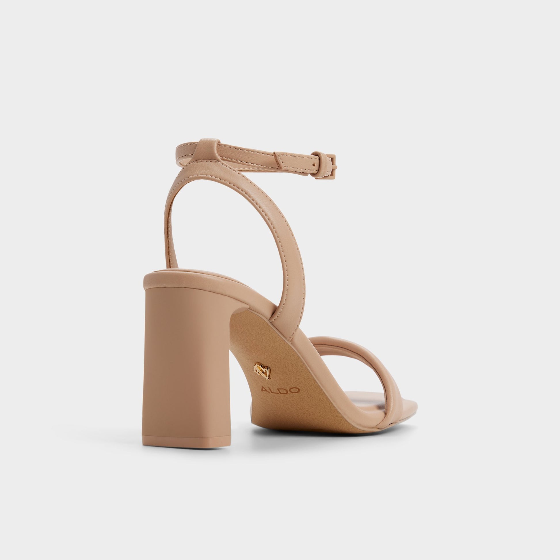 Three-quarter angle of Bone Aurorai Strappy heeled sandal's back side