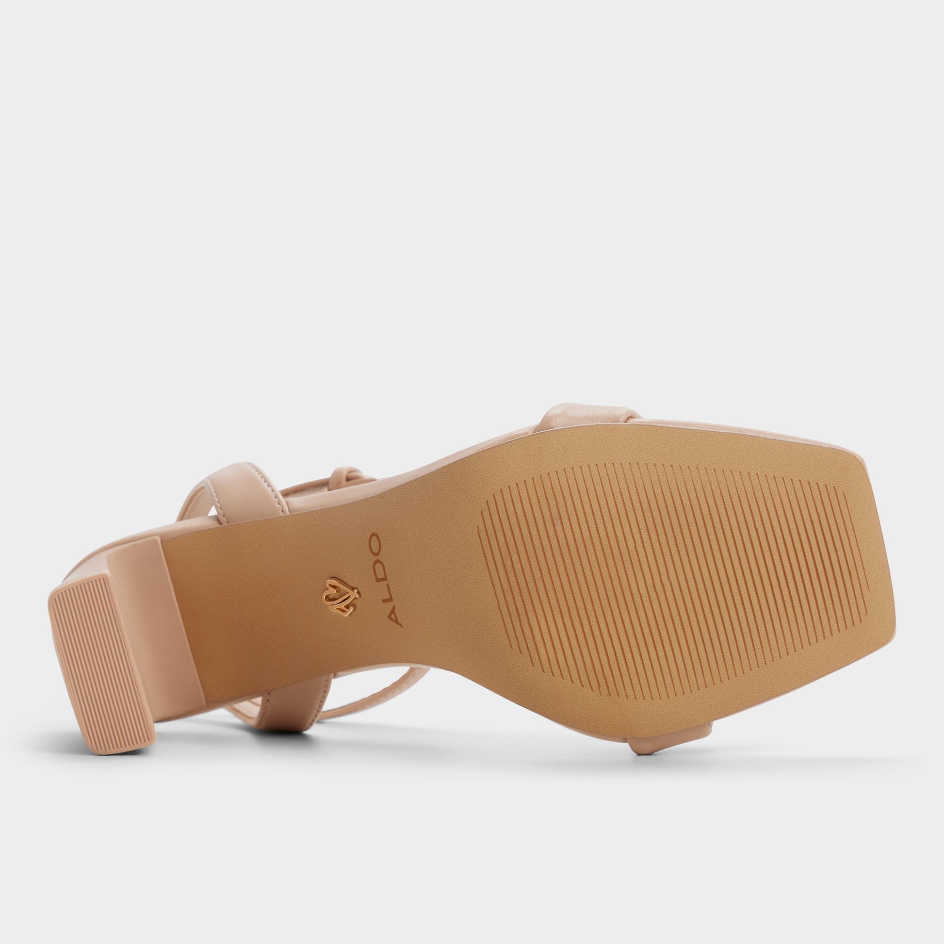 View of Bone Aurorai Strappy heeled sandal's sole