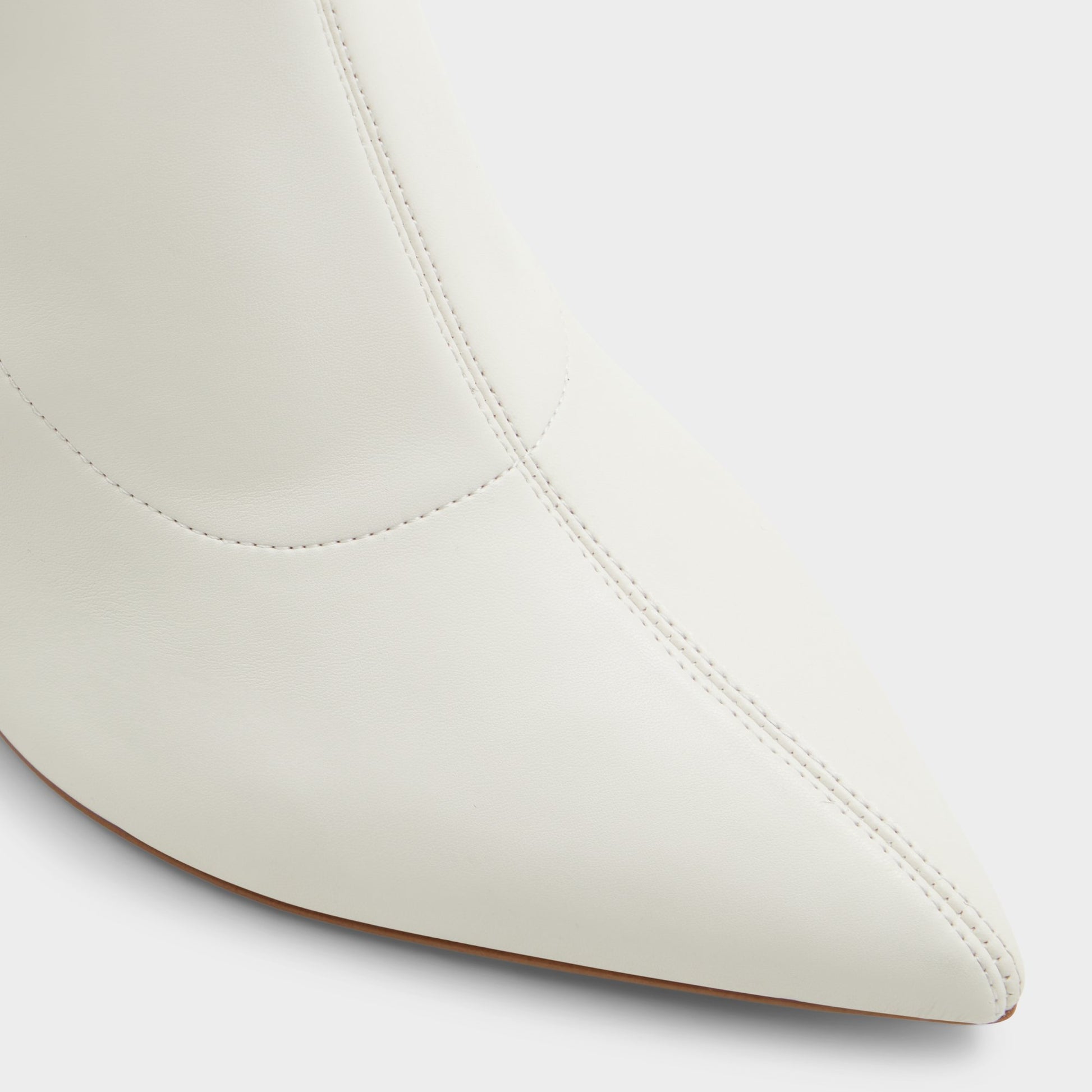 Close-up of the White/Bone Figtree Ankle boot