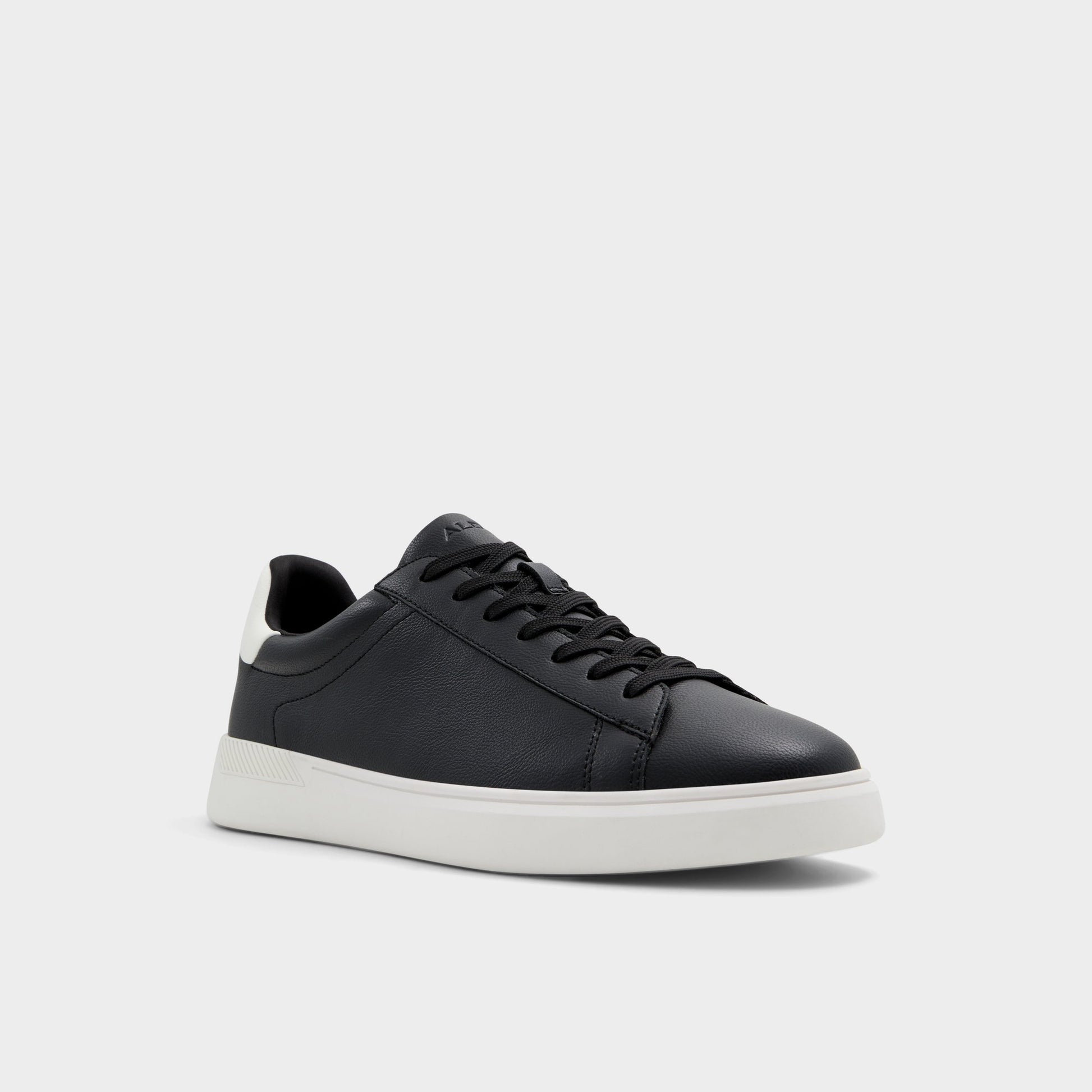 Three-quarter angle of Black Coolspec Low top sneaker's front side