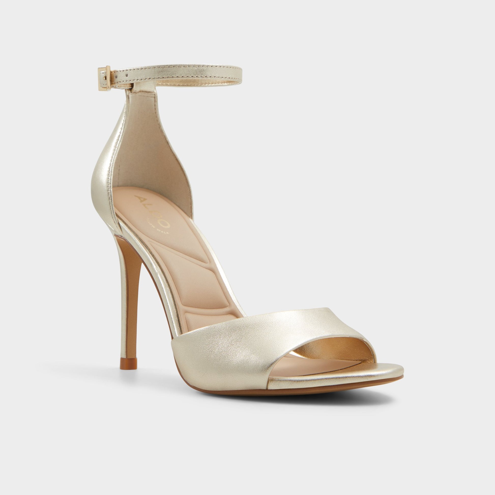 Three-quarter angle of Gold Creride Strappy heeled sandal's front side