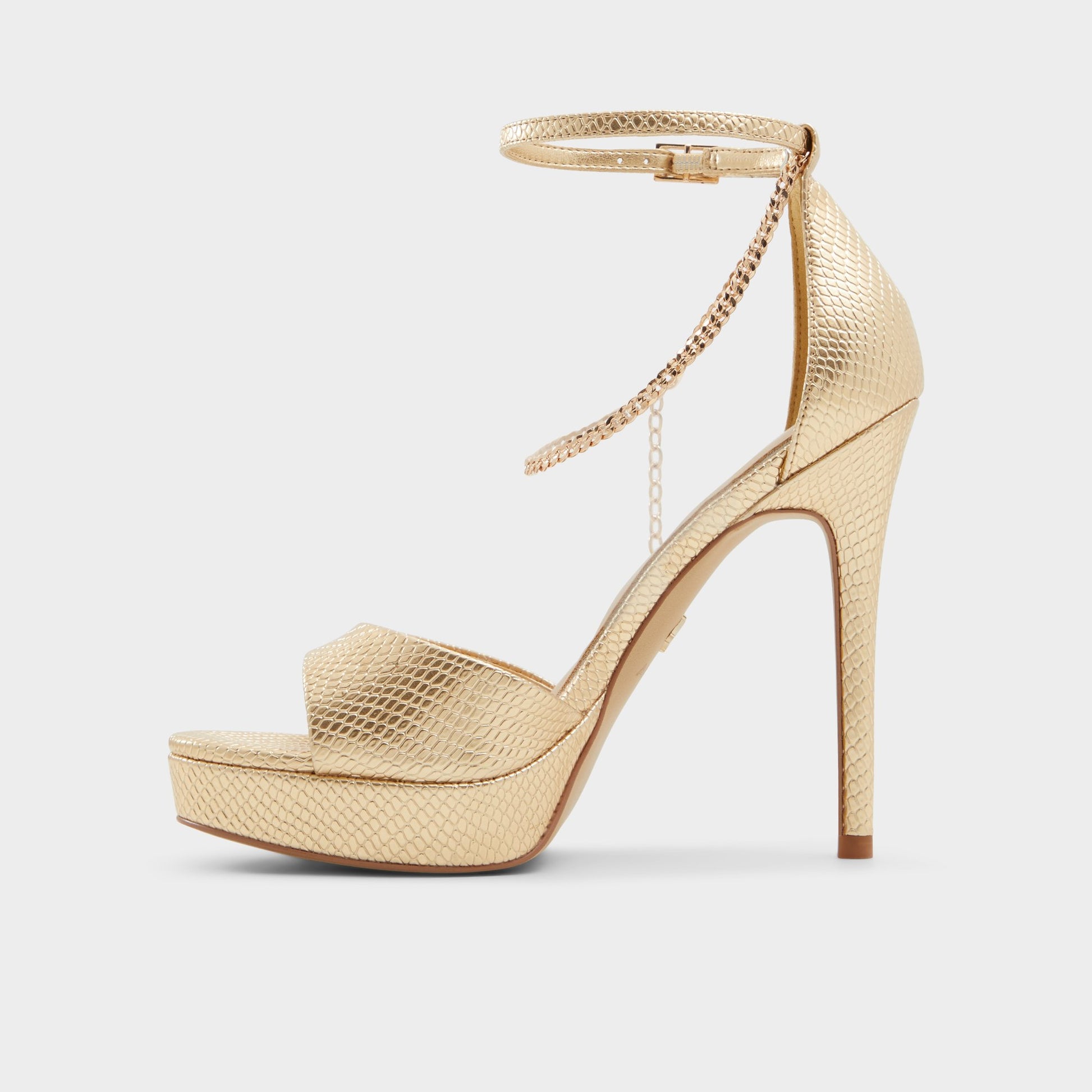 Side view of Gold Afumeth Strappy heeled sandal