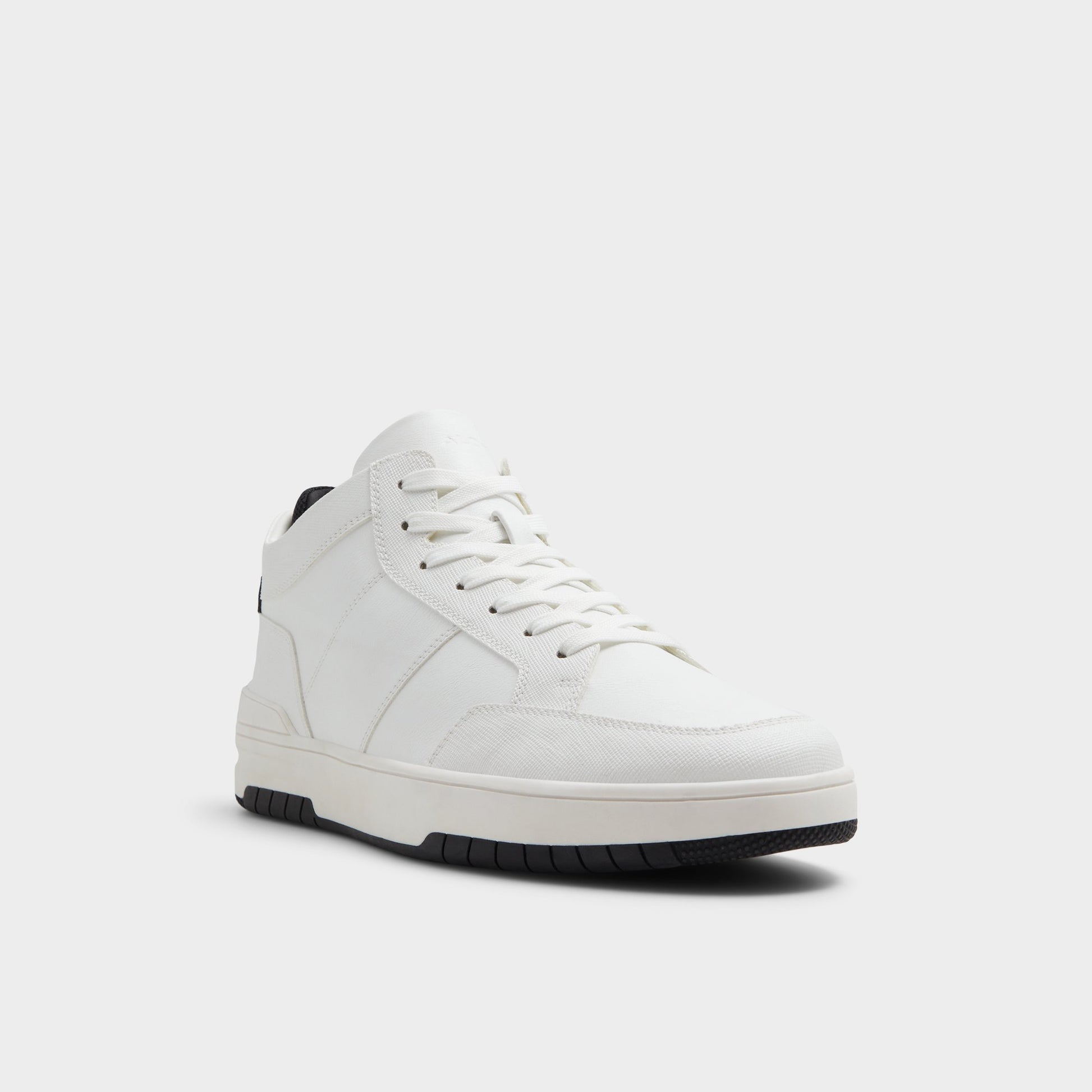 Three-quarter angle of White Victor High top sneaker's front side