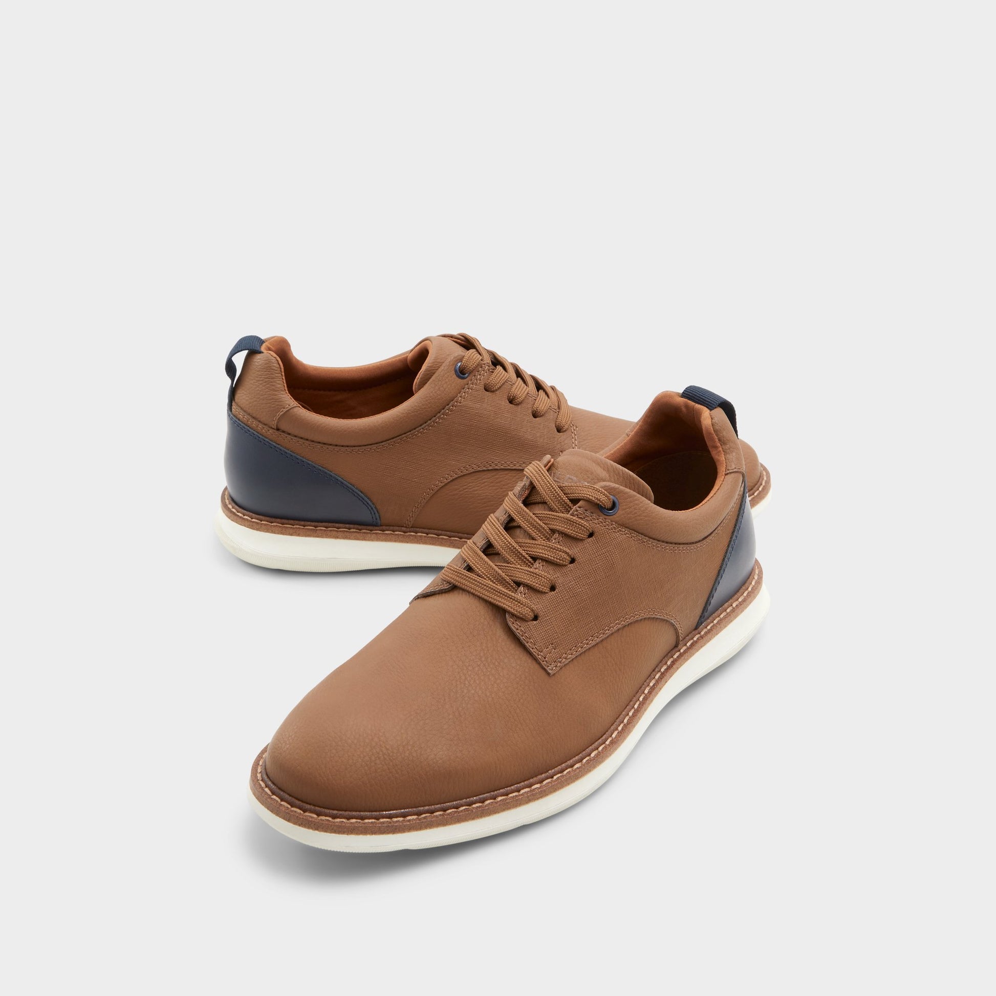 Highlighted view of a pair of Cognac Preth Oxford shoes