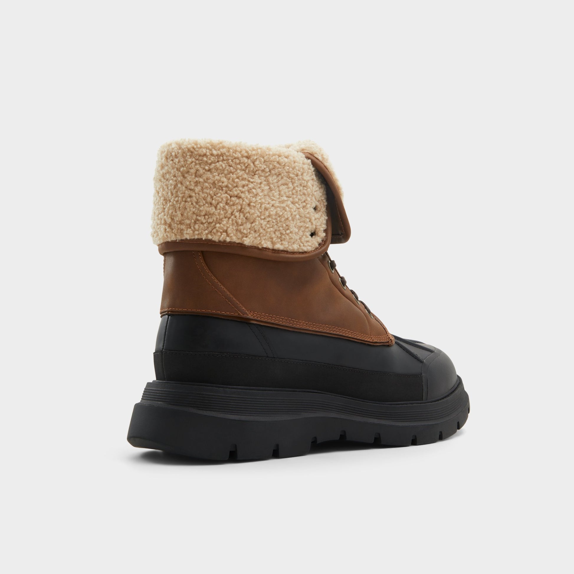 Three-quarter angle of Cognac Delburn Lace-up boot's back side