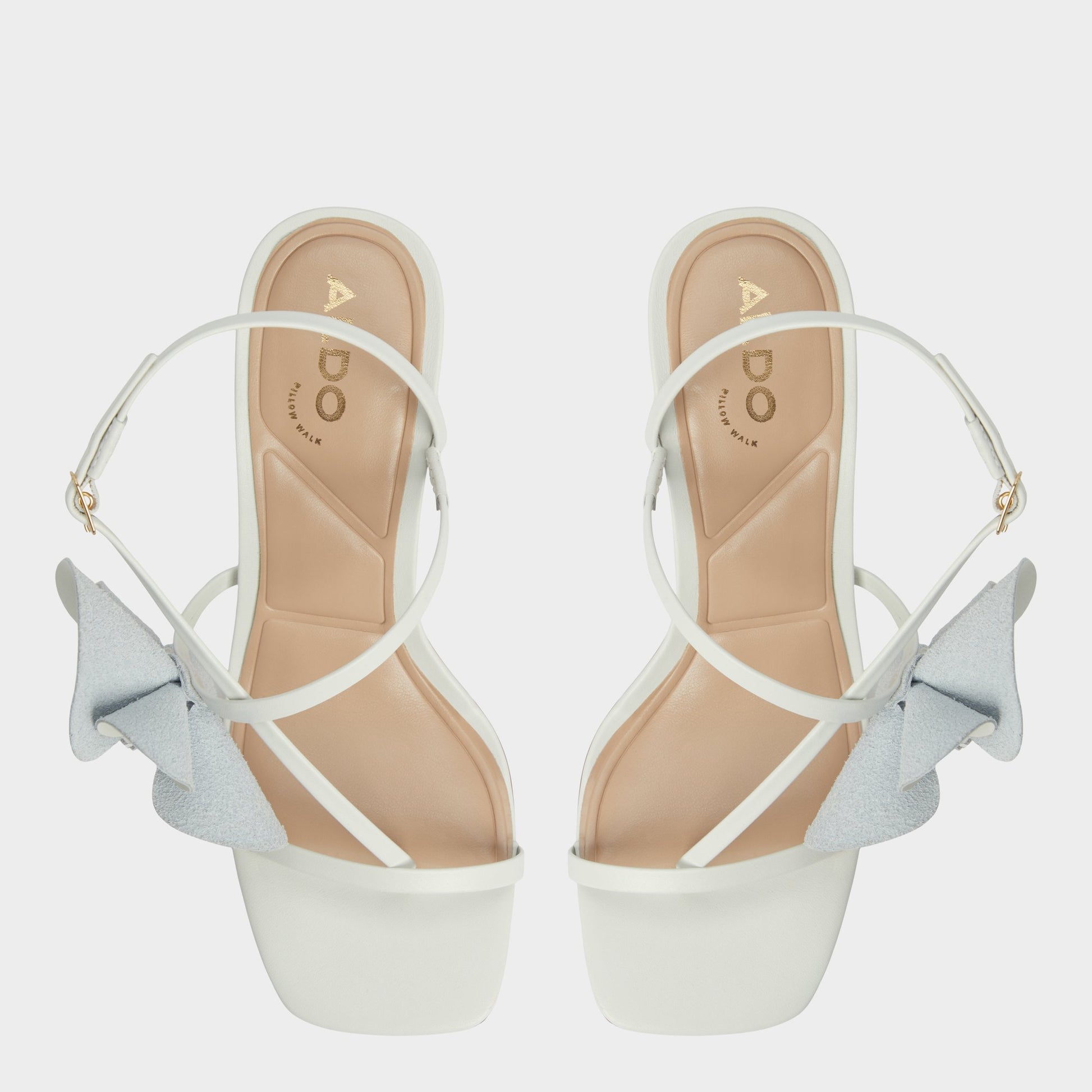 Top-down view of the White/Bone Sandflower Strappy heeled sandal