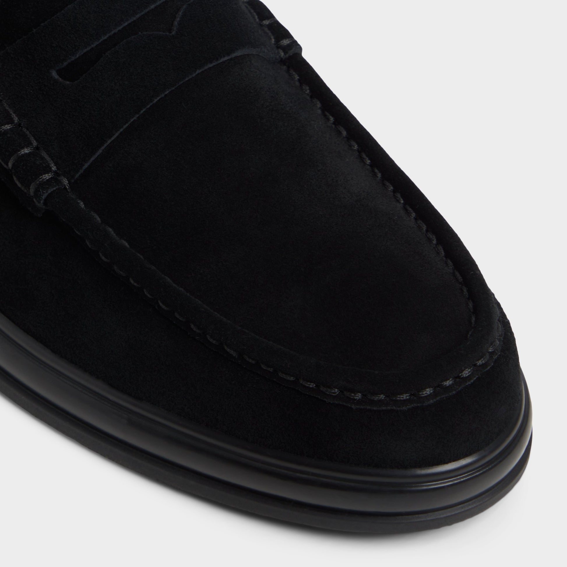 Close-up of the Black/Black Tucker Loafer