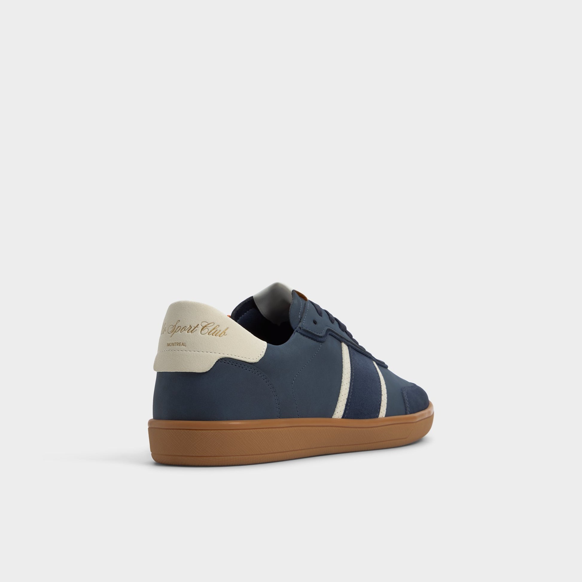 Three-quarter angle of Navy Uptown Low top sneaker's back side