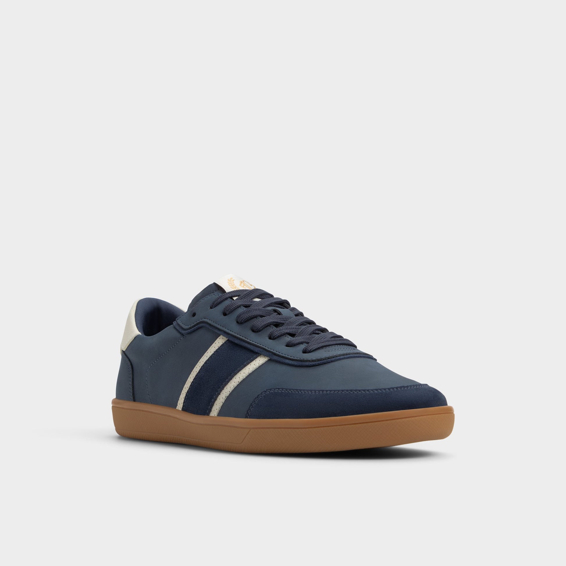 Three-quarter angle of Navy Uptown Low top sneaker's front side