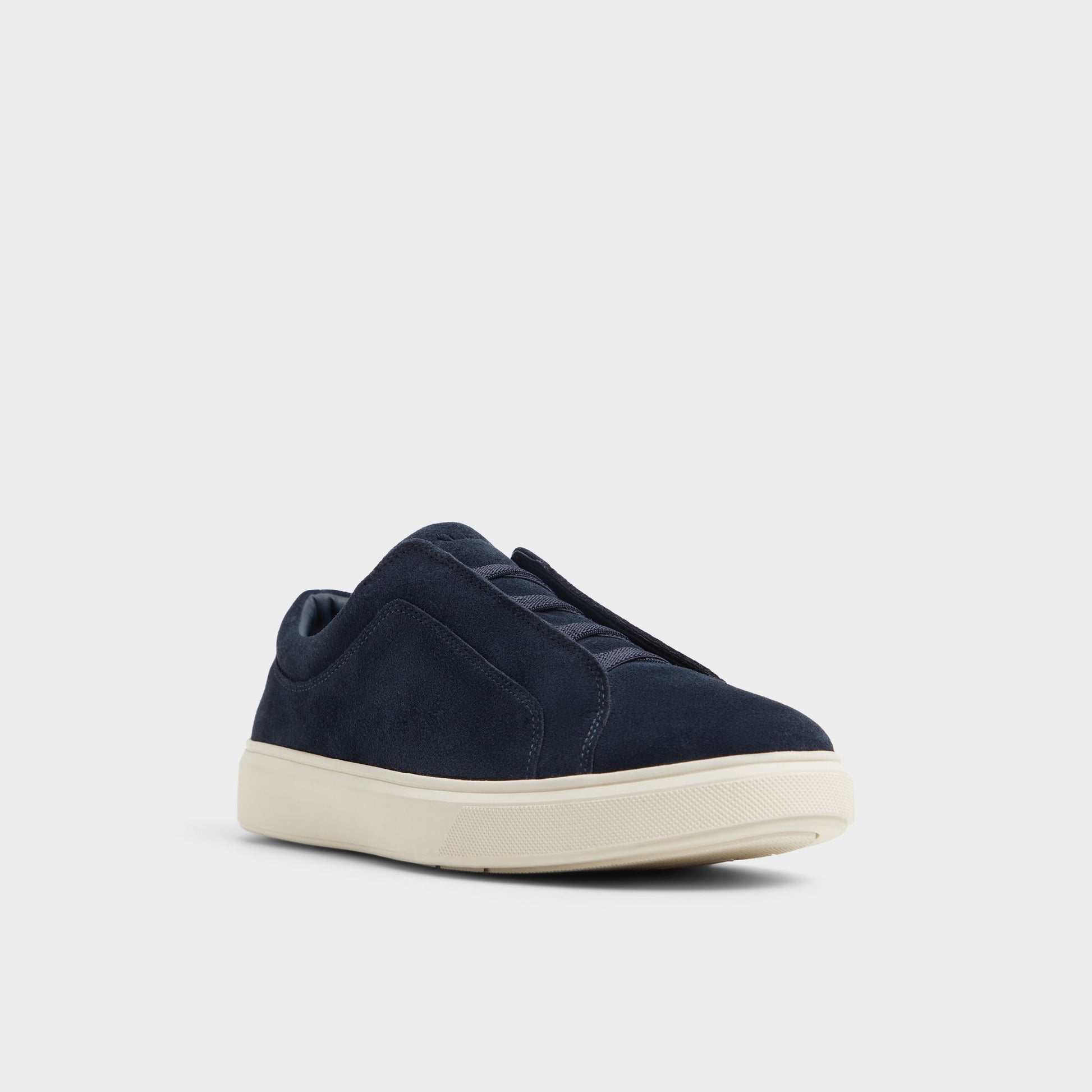 Three-quarter angle of Navy Abbott Slip-on sneaker's front side