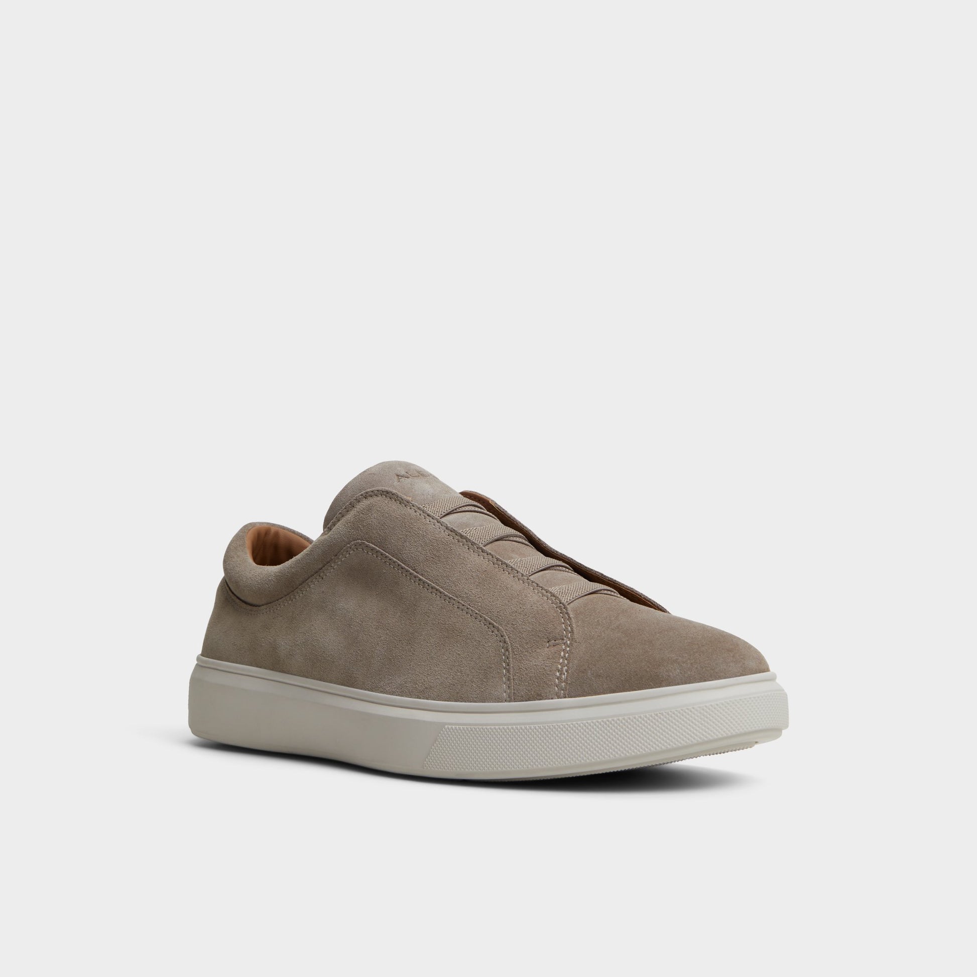 Three-quarter angle of Beige Abbott Slip-on sneaker's front side