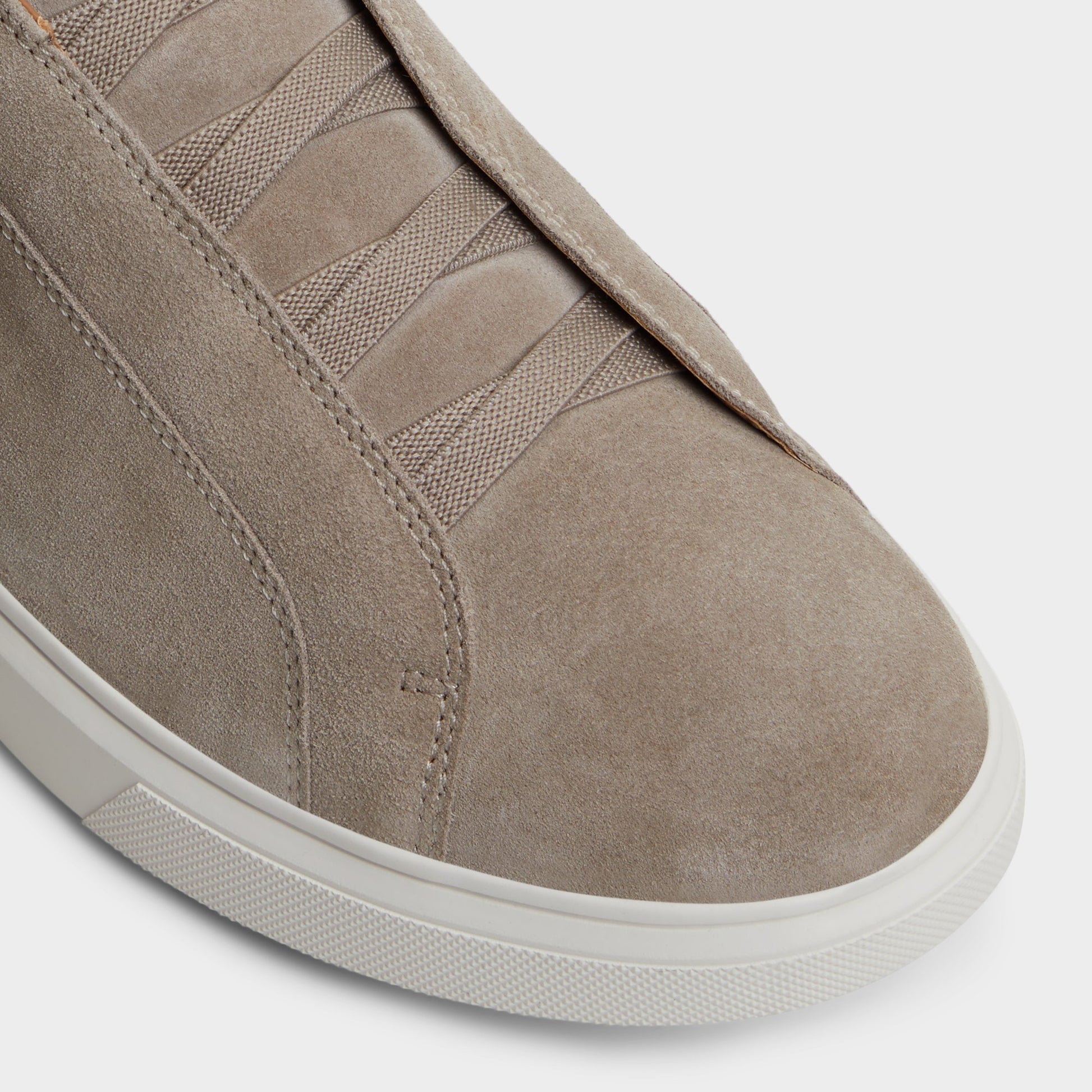 Close-up of the Beige Abbott Slip-on sneaker