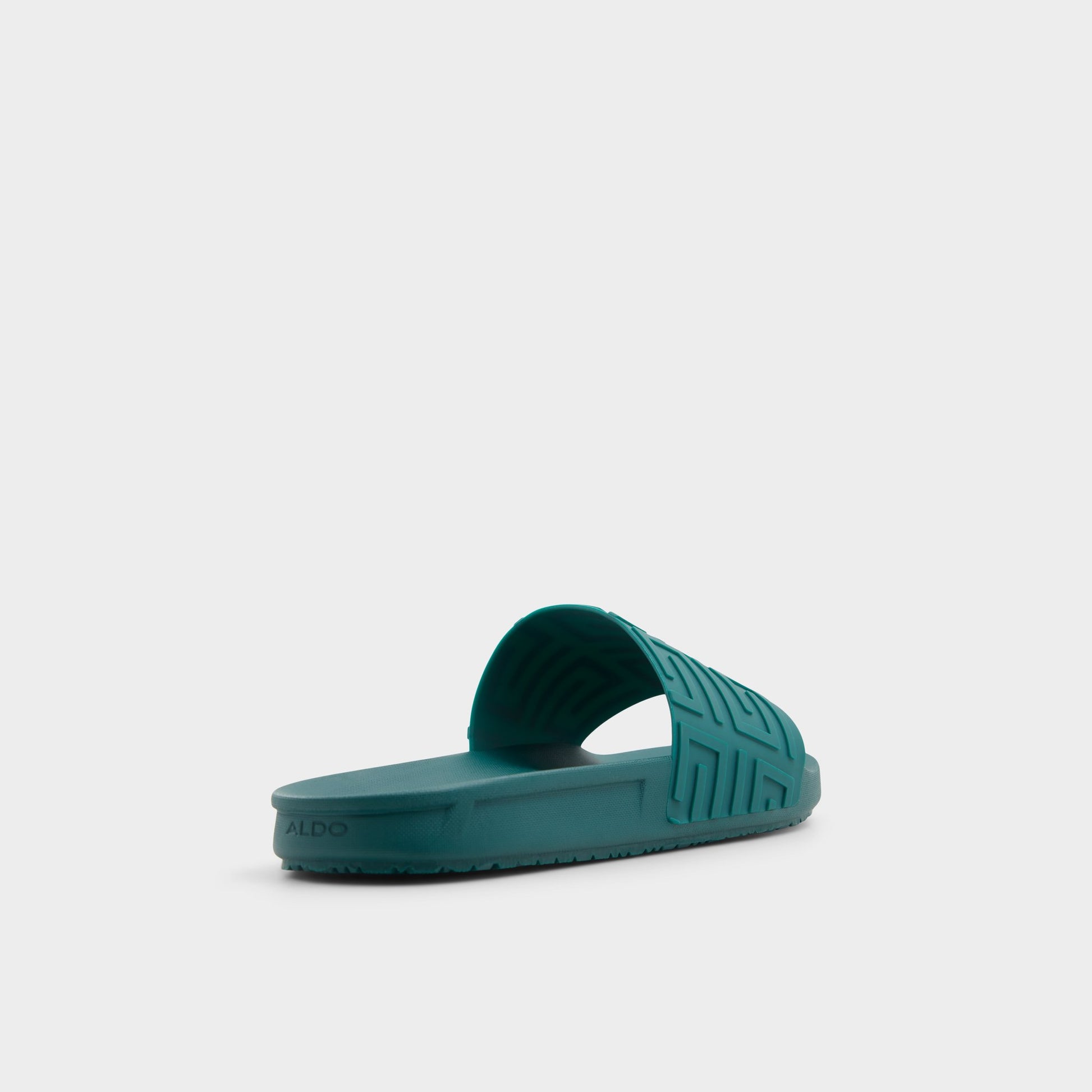 Three-quarter angle of Green Atrani Slide sandal's back side