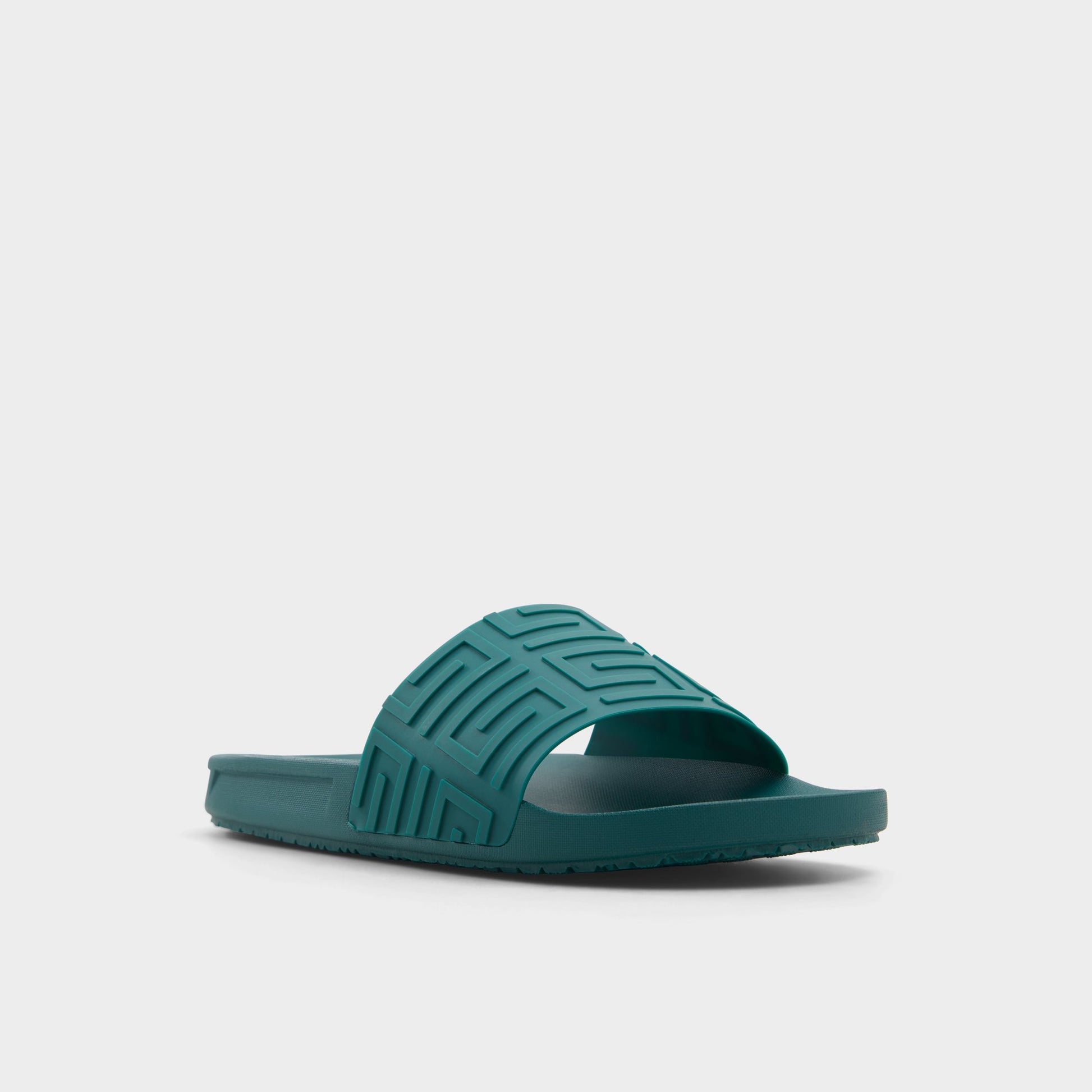 Three-quarter angle of Green Atrani Slide sandal's front side