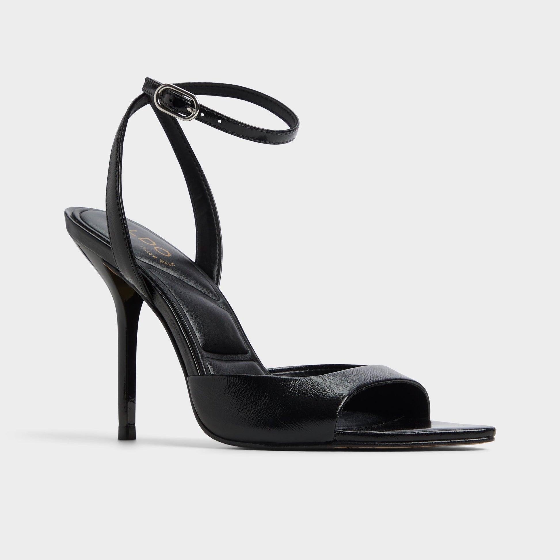 Three-quarter angle of Black Forevermore Strappy heeled sandal's front side