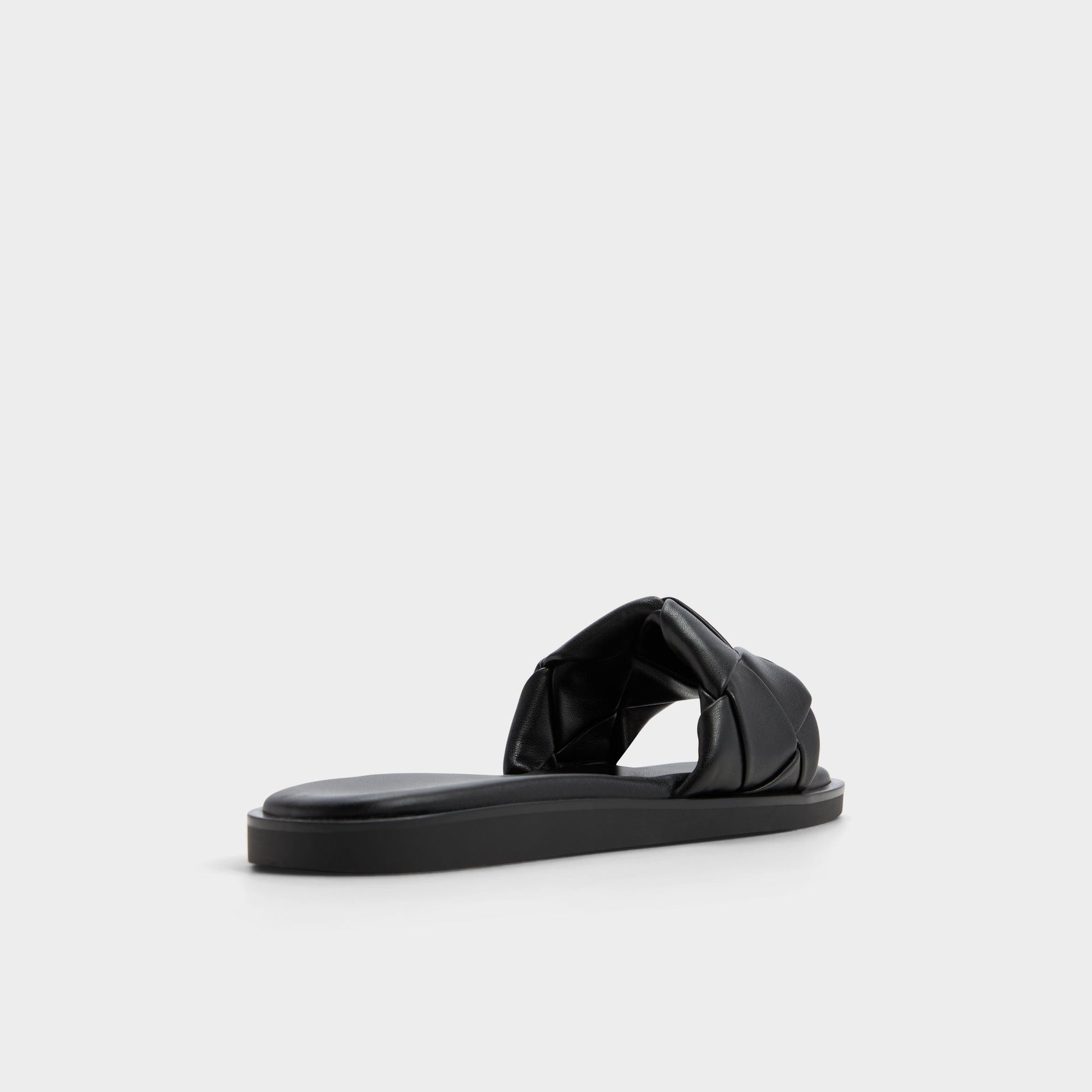 Three-quarter angle of Other black Esterelle Slide sandal's back side