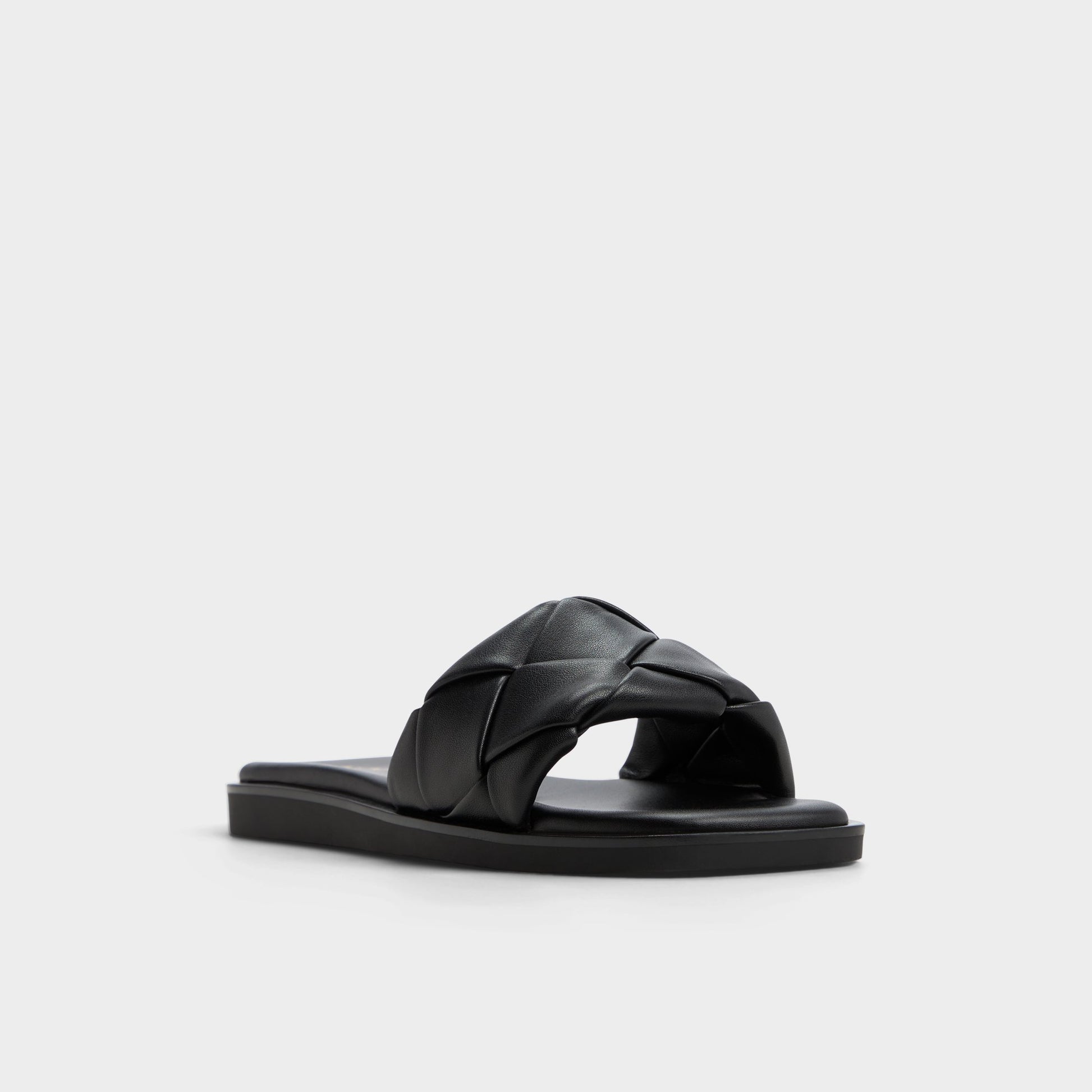 Three-quarter angle of Other black Esterelle Slide sandal's front side