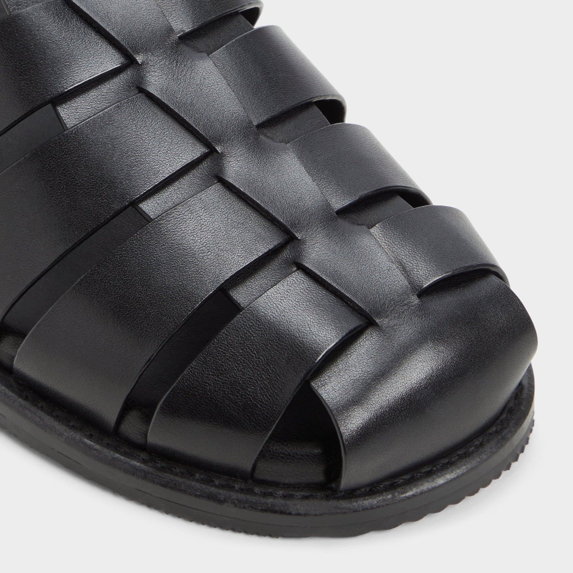Close-up of the Black Wildhaven Flat sandal