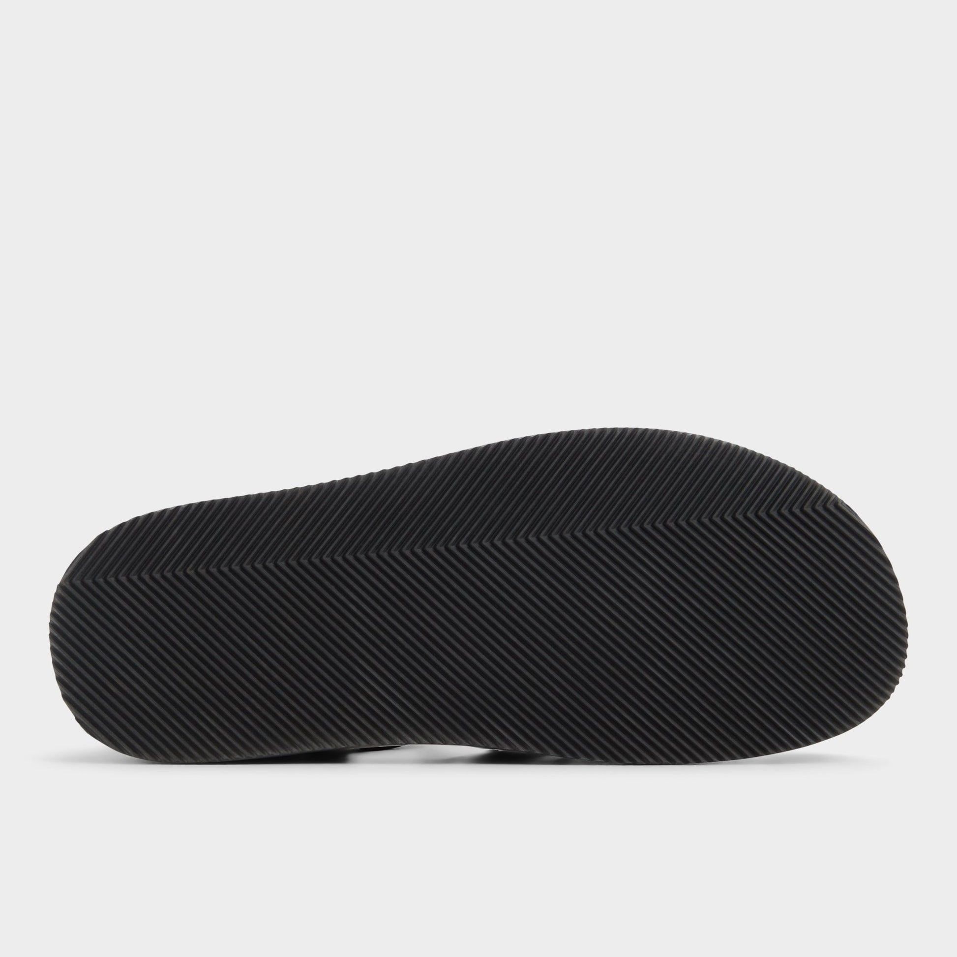 View of Black Wildhaven Flat sandal's sole