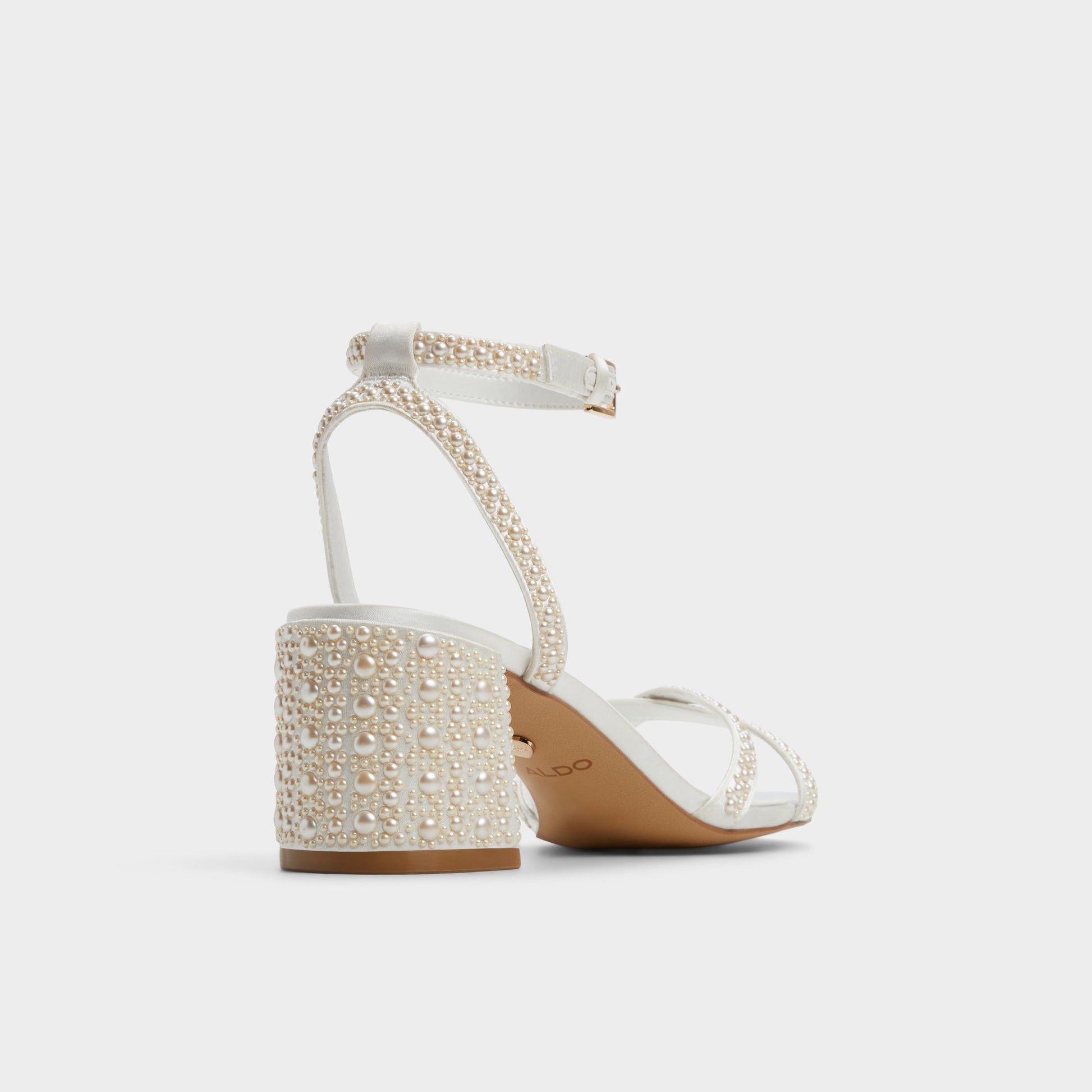 Three-quarter angle of Other White Bouclettie Strappy heeled sandal's back side
