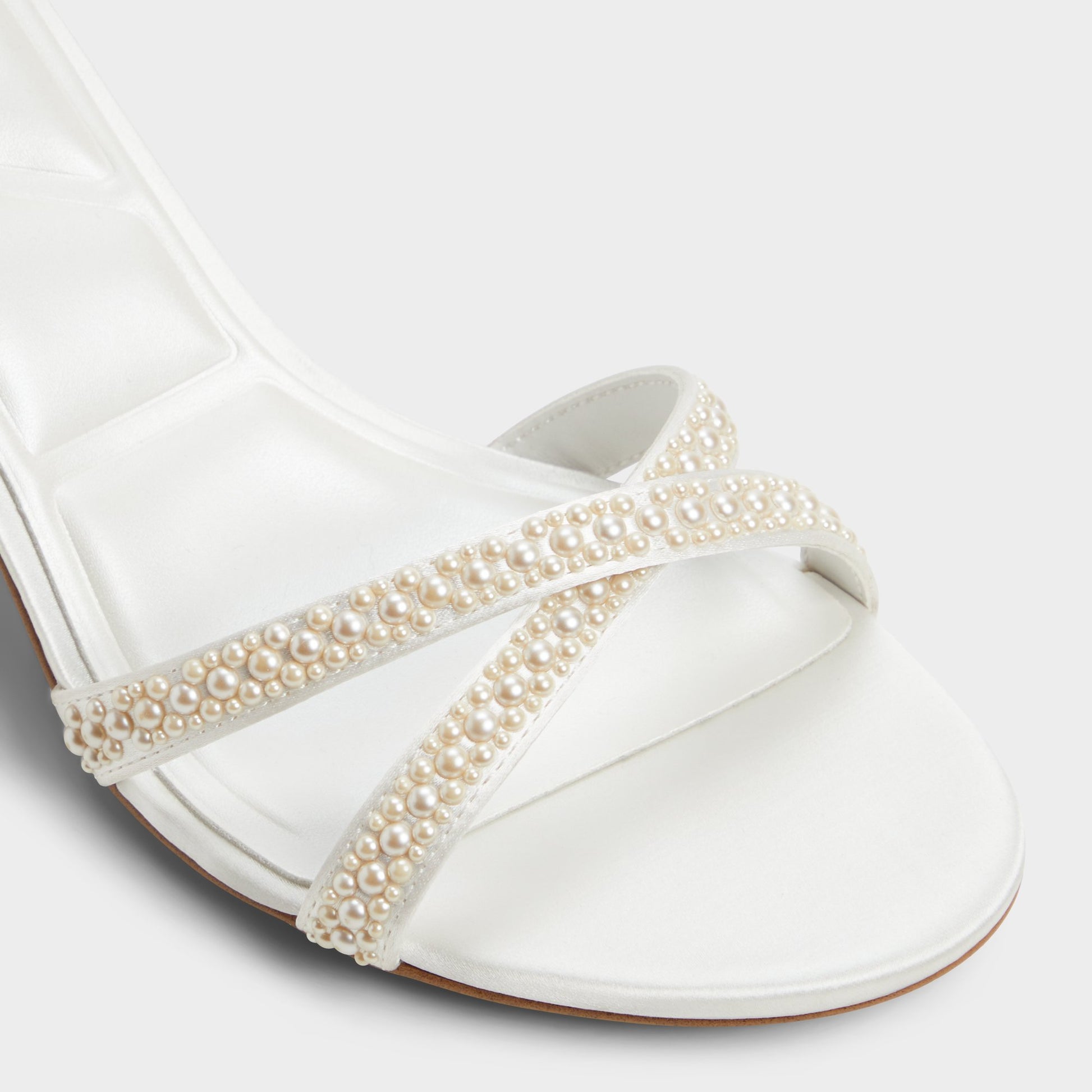 Close-up of the Other White Bouclettie Strappy heeled sandal