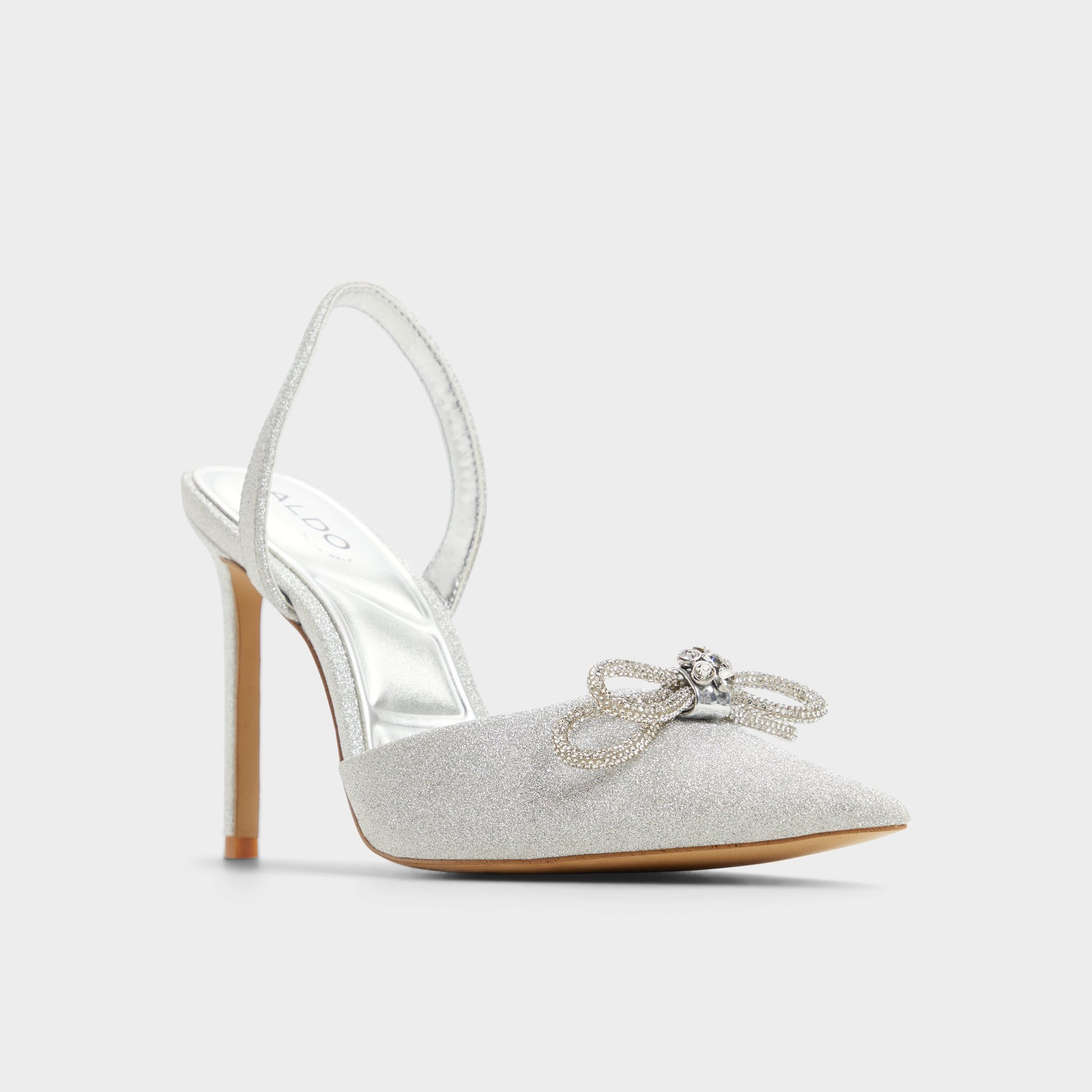 Three-quarter angle of Silver Addie Slingback heel's front side