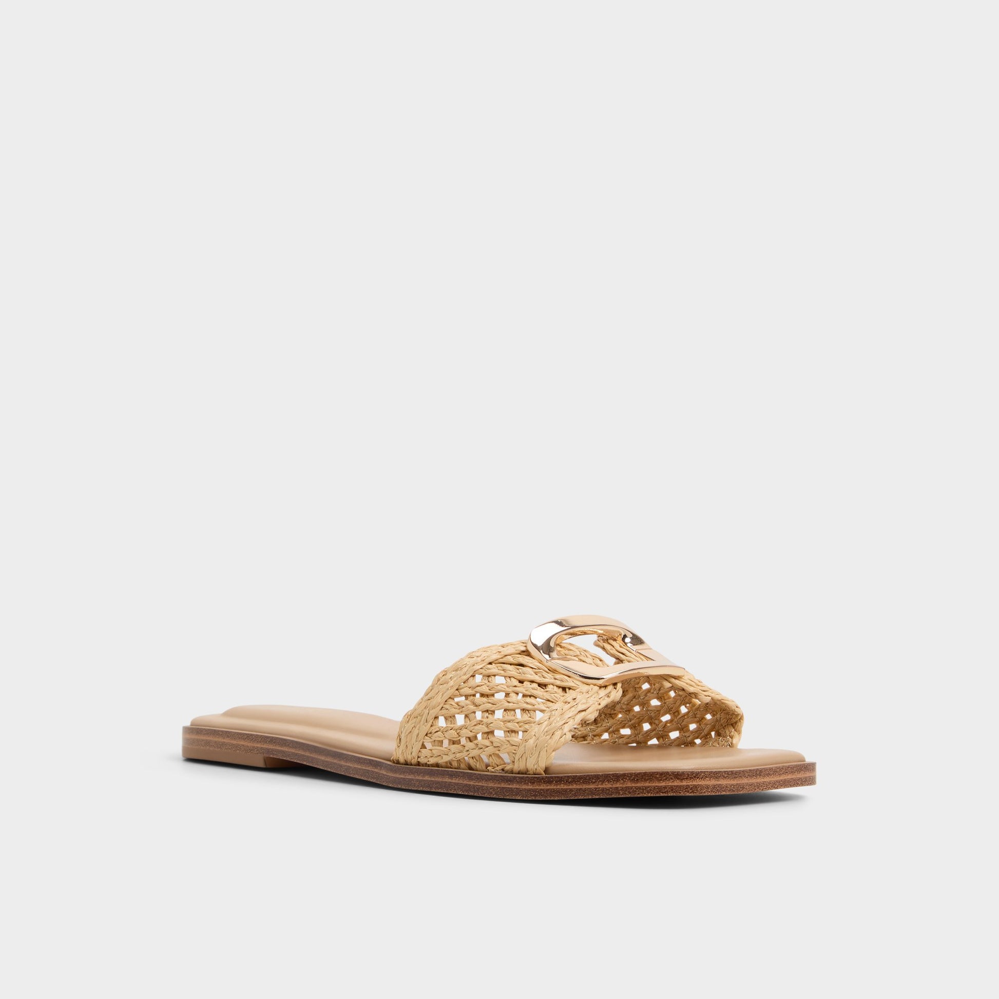 Three-quarter angle of Natural Tidella Slide sandal's front side