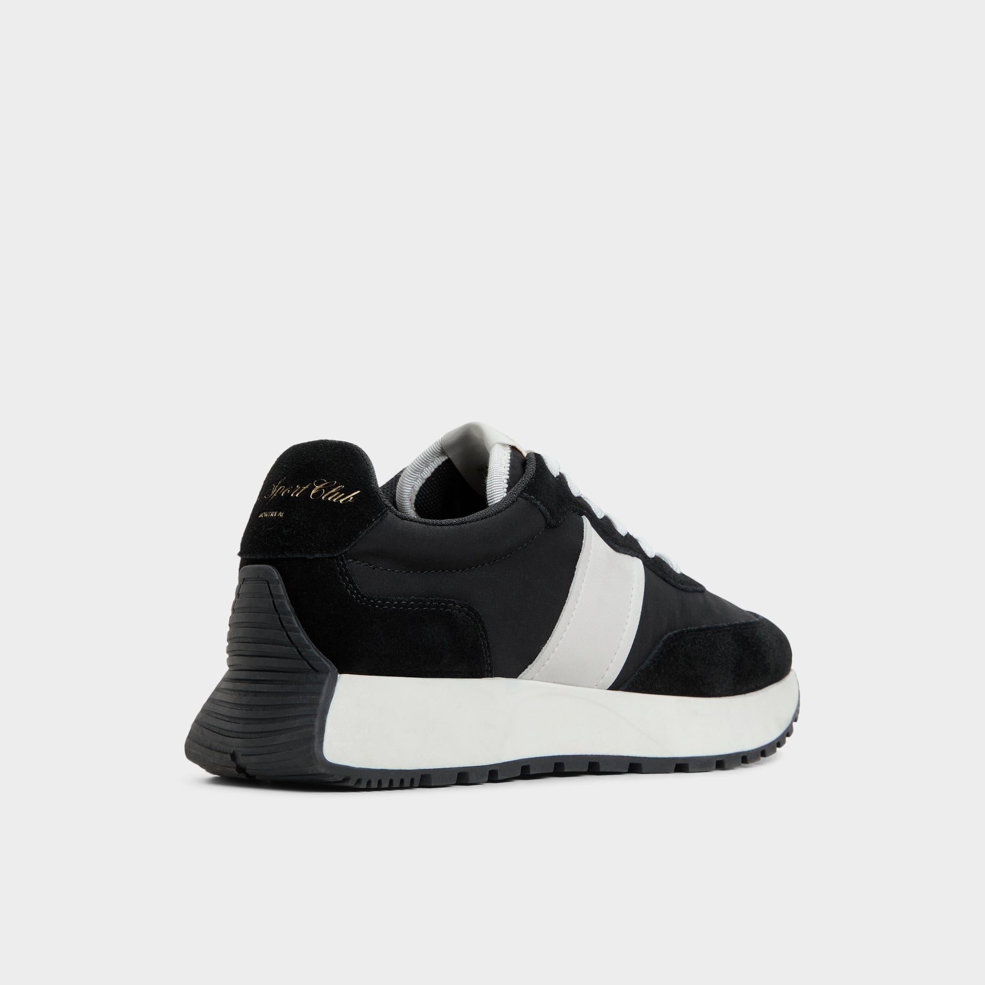 Three-quarter angle of Black/White Proader Jogger sneaker's back side