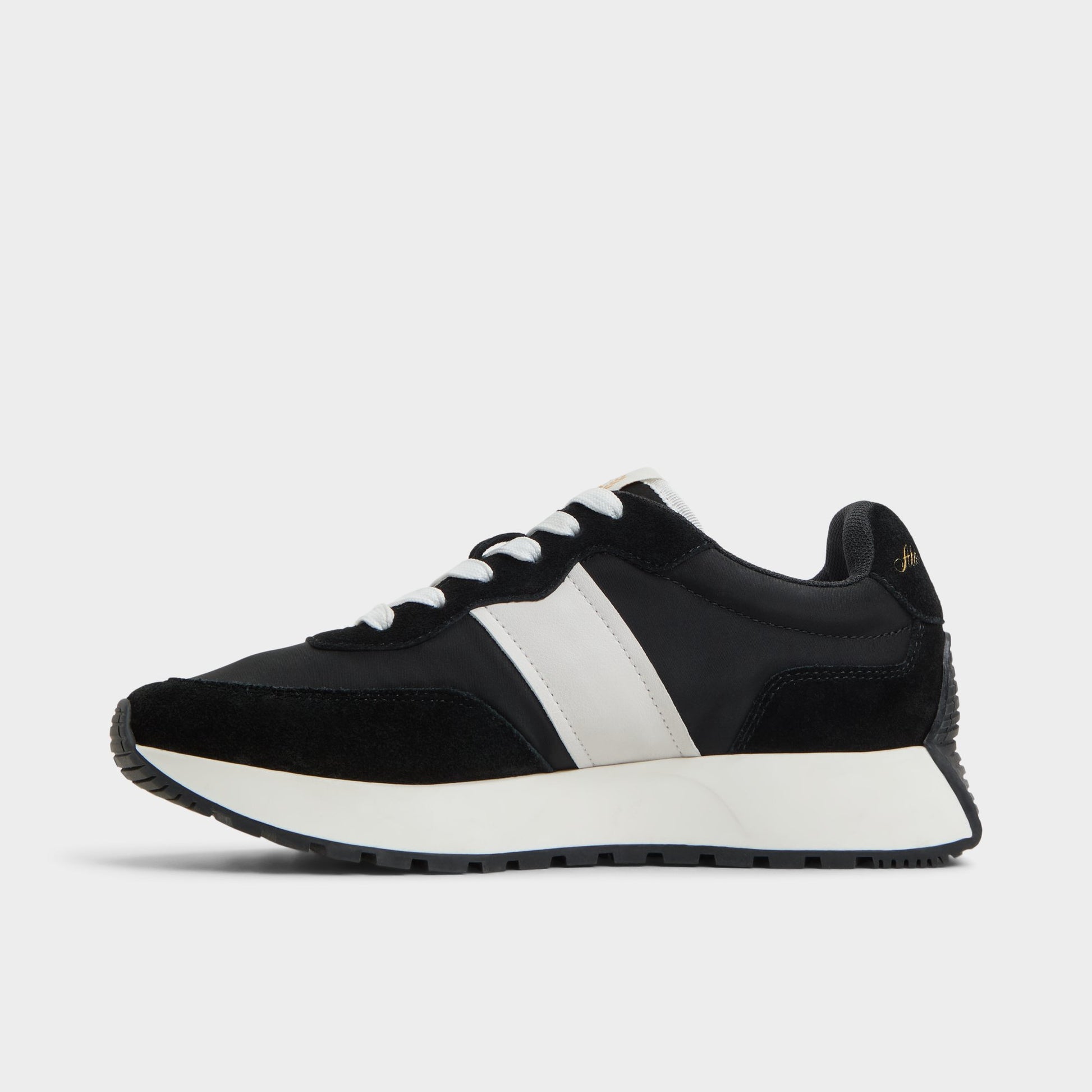 Side view of Black/White Proader Jogger sneaker