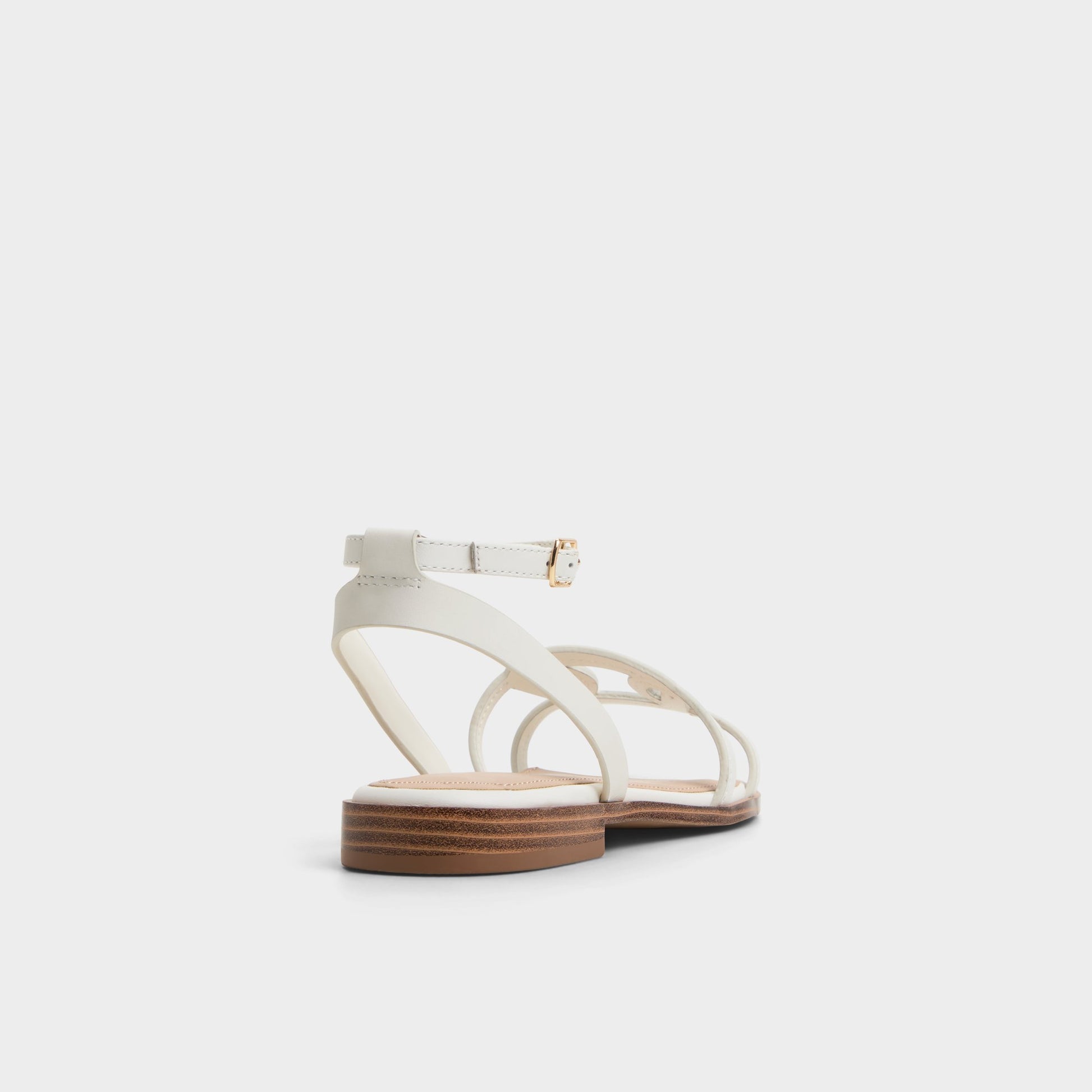 Three-quarter angle of White Greengrove Flat sandal's back side