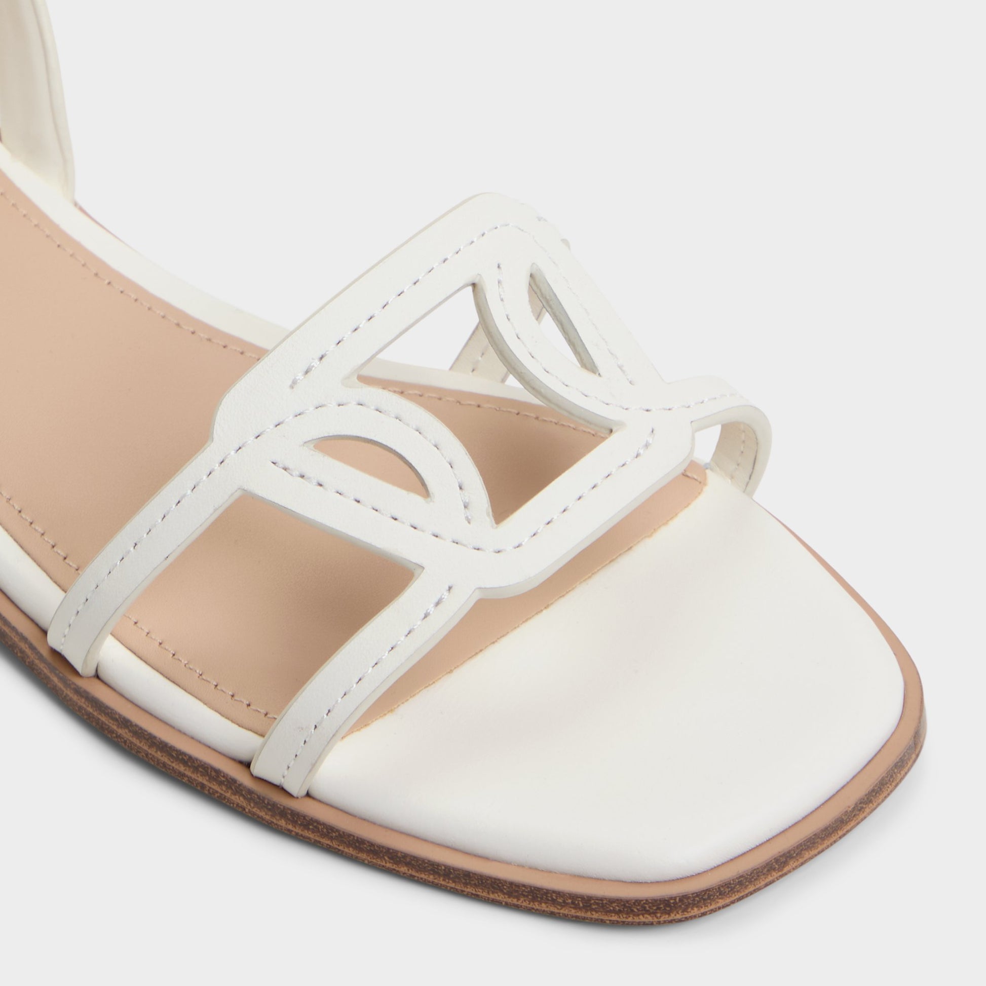 Close-up of the White Greengrove Flat sandal
