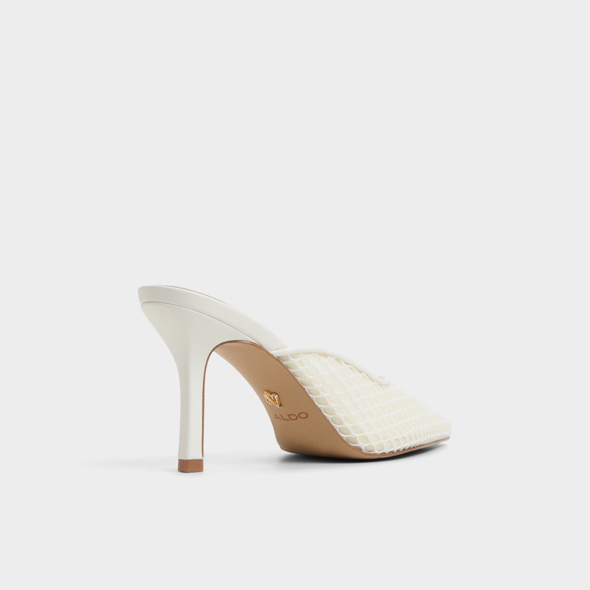 Three-quarter angle of Open White Gamilia Heeled mule's back side