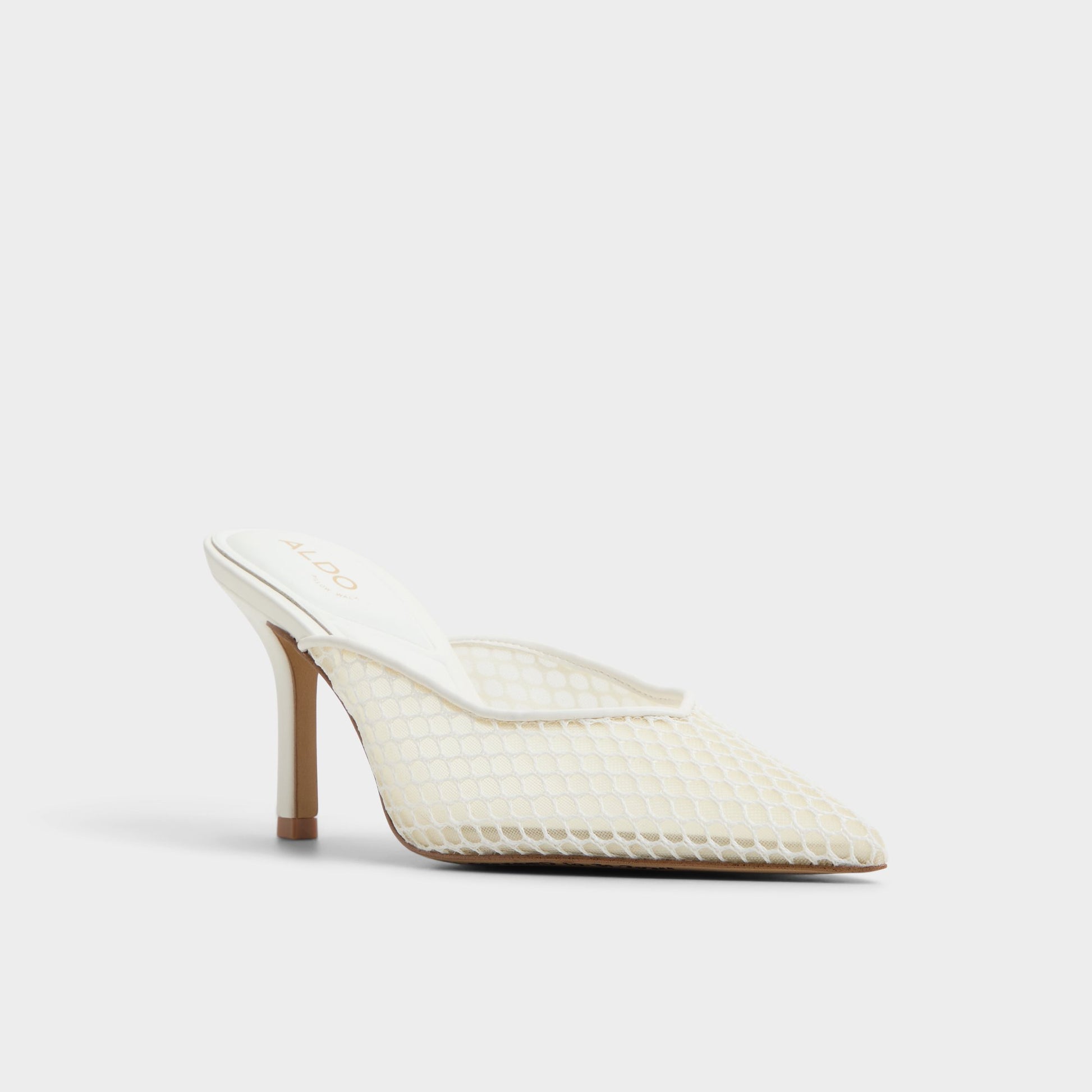 Three-quarter angle of Open White Gamilia Heeled mule's front side