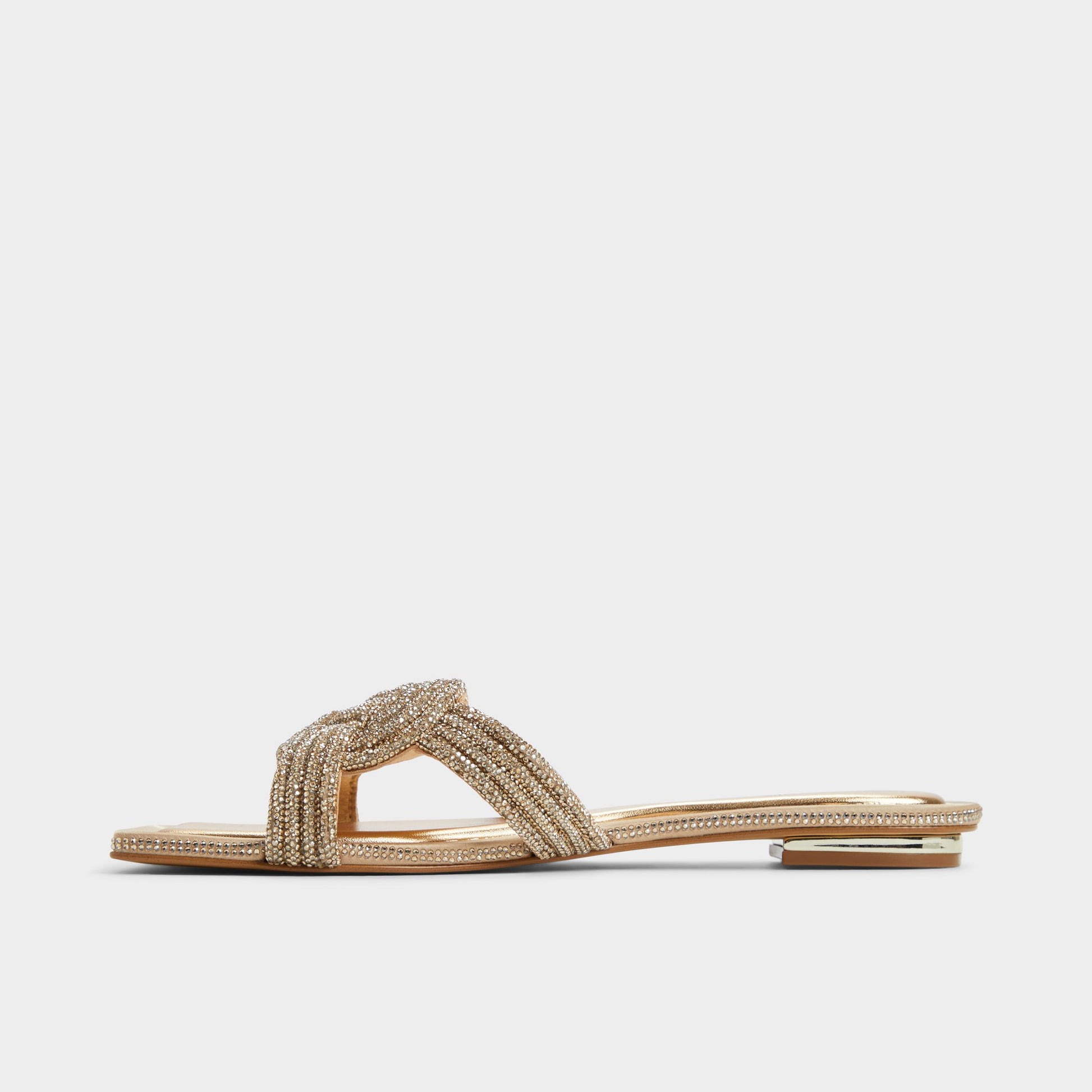 Side view of Gold Karlina Slide sandal