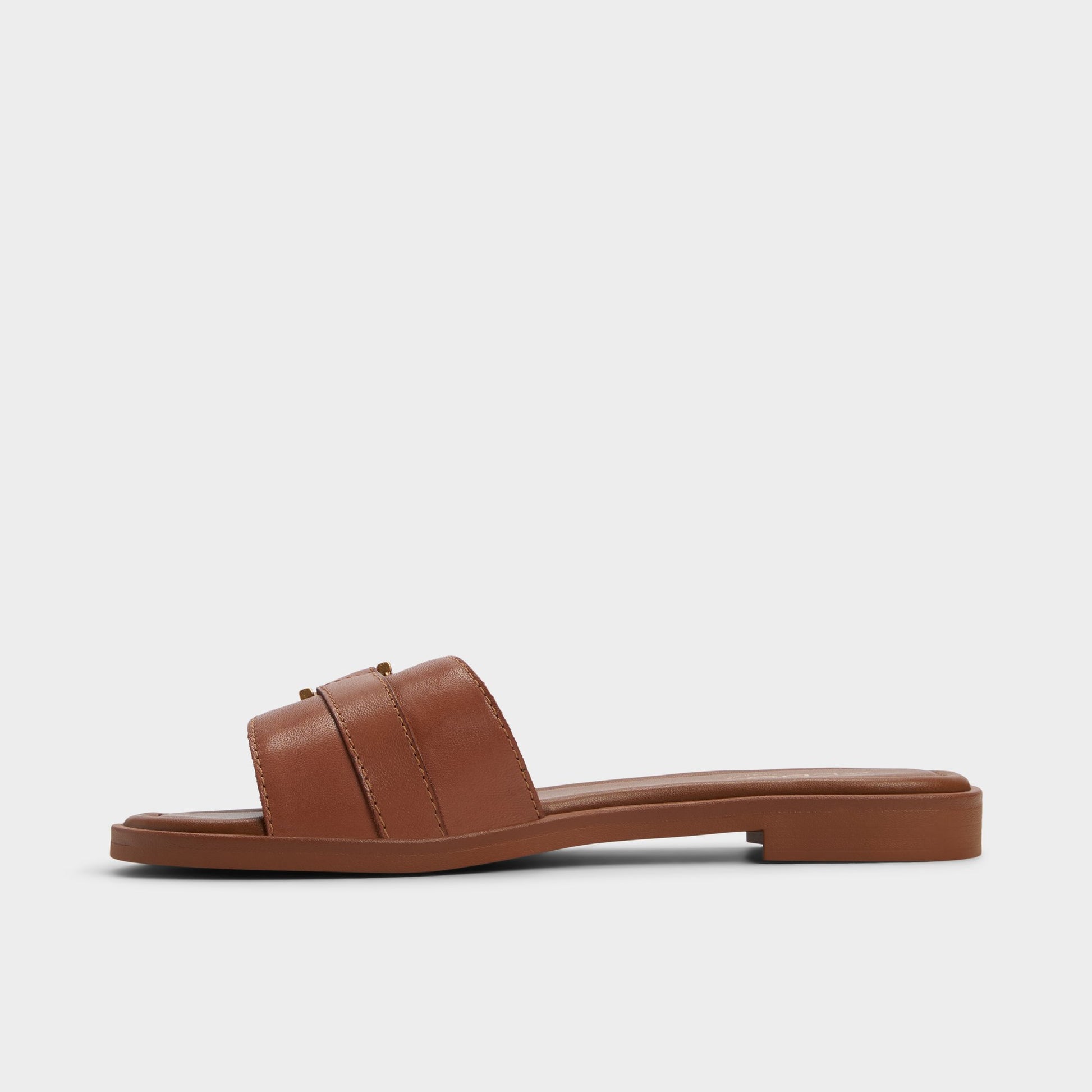 Side view of Medium Brown Dallaedar Slide sandal