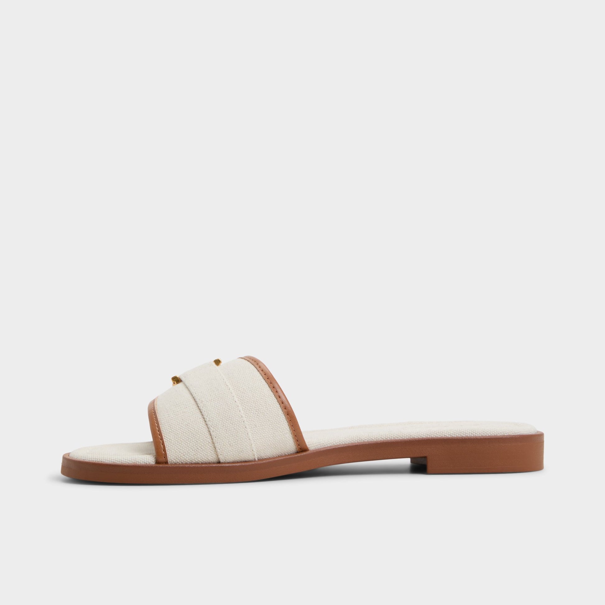 Side view of White Combo Dallaedar Slide sandal