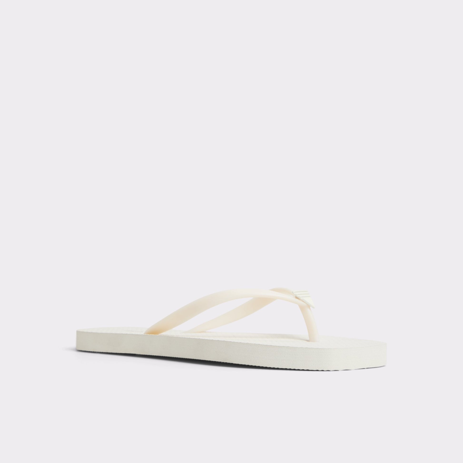 Three-quarter angle of White Beachready Flip flop's front side