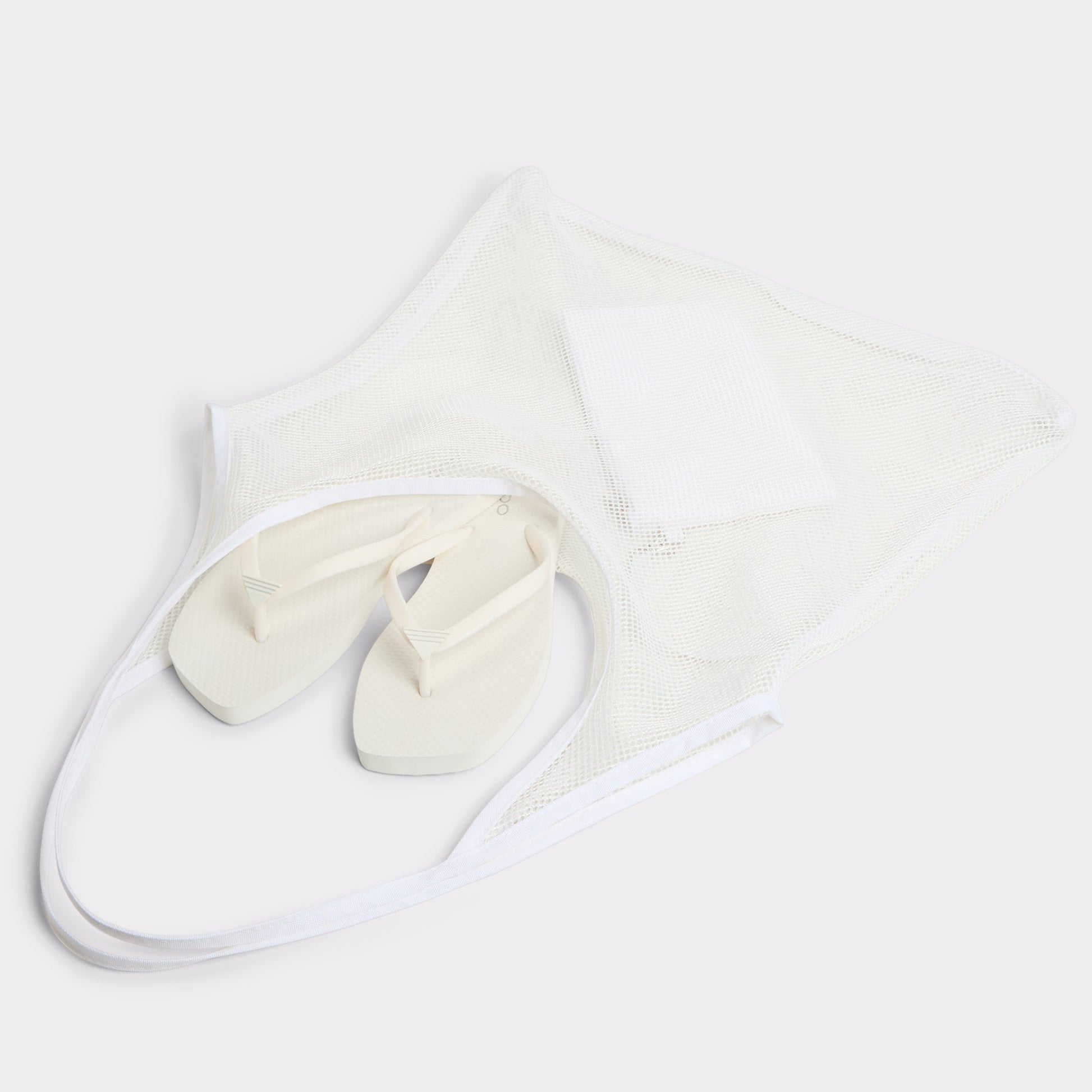 Highlighted view of a pair of White Beachready Flip flops