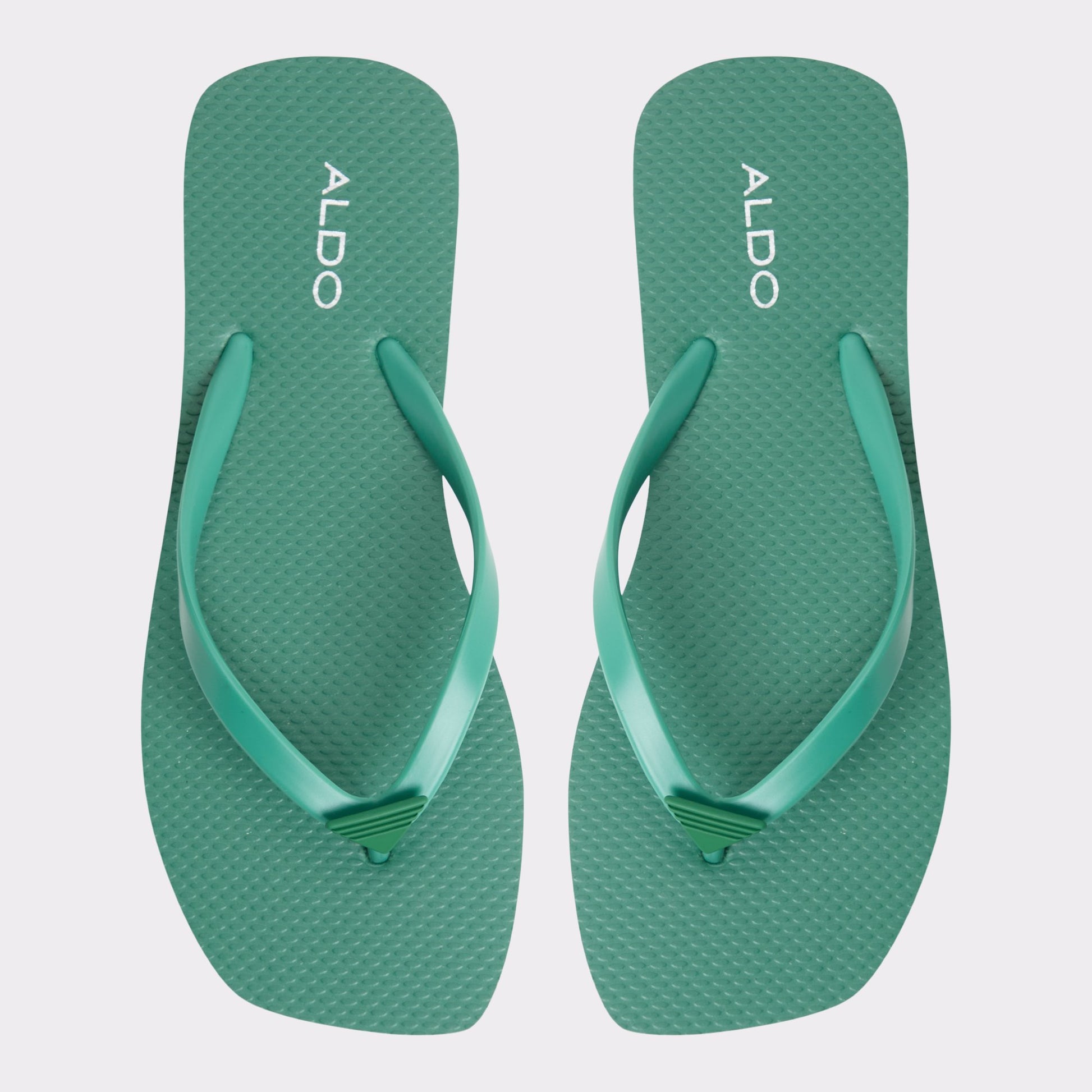 Three-quarter angle of Medium Green Beachready Flip flop's back side