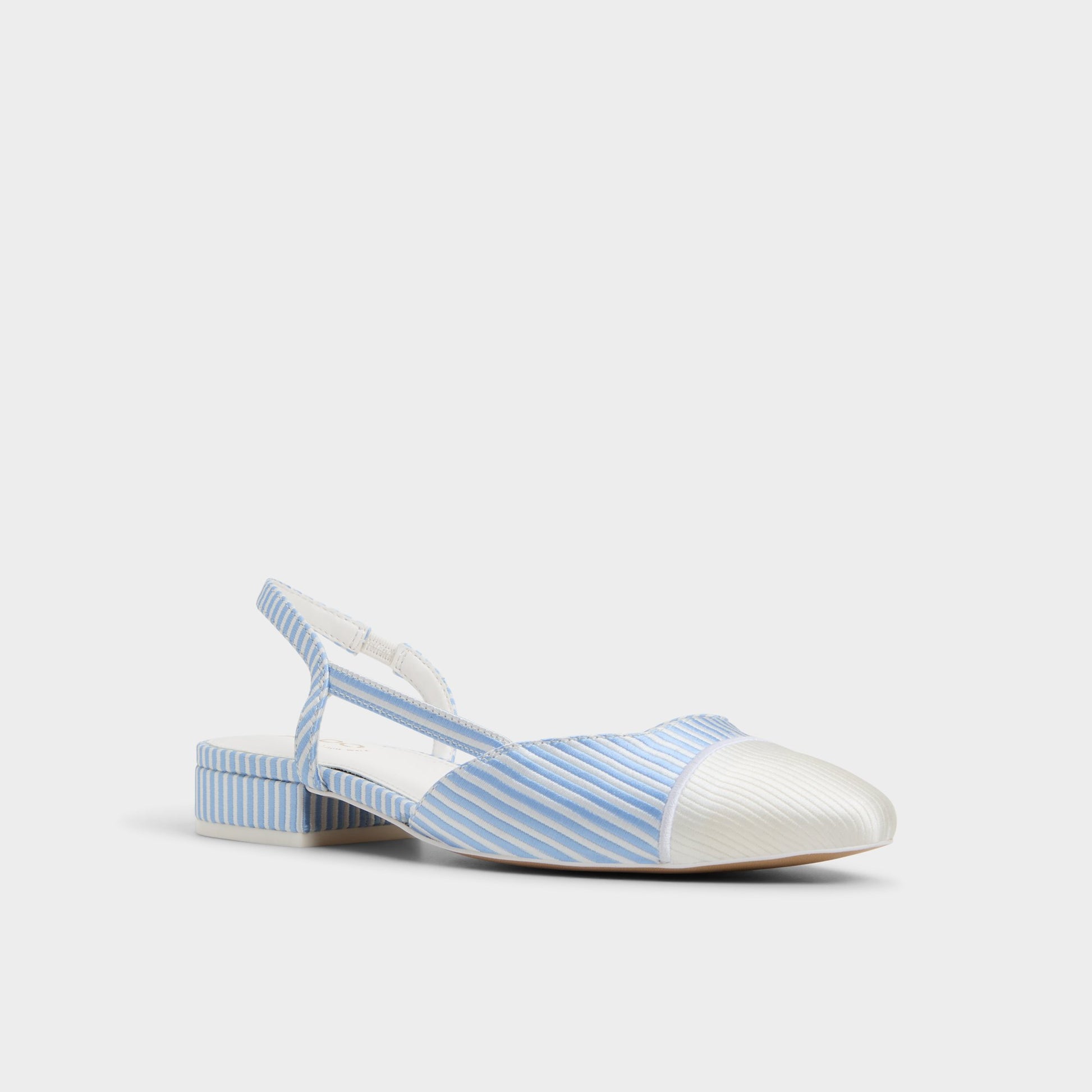 Three-quarter angle of Blue/White Combo Clementinne Sling back high heel's front side